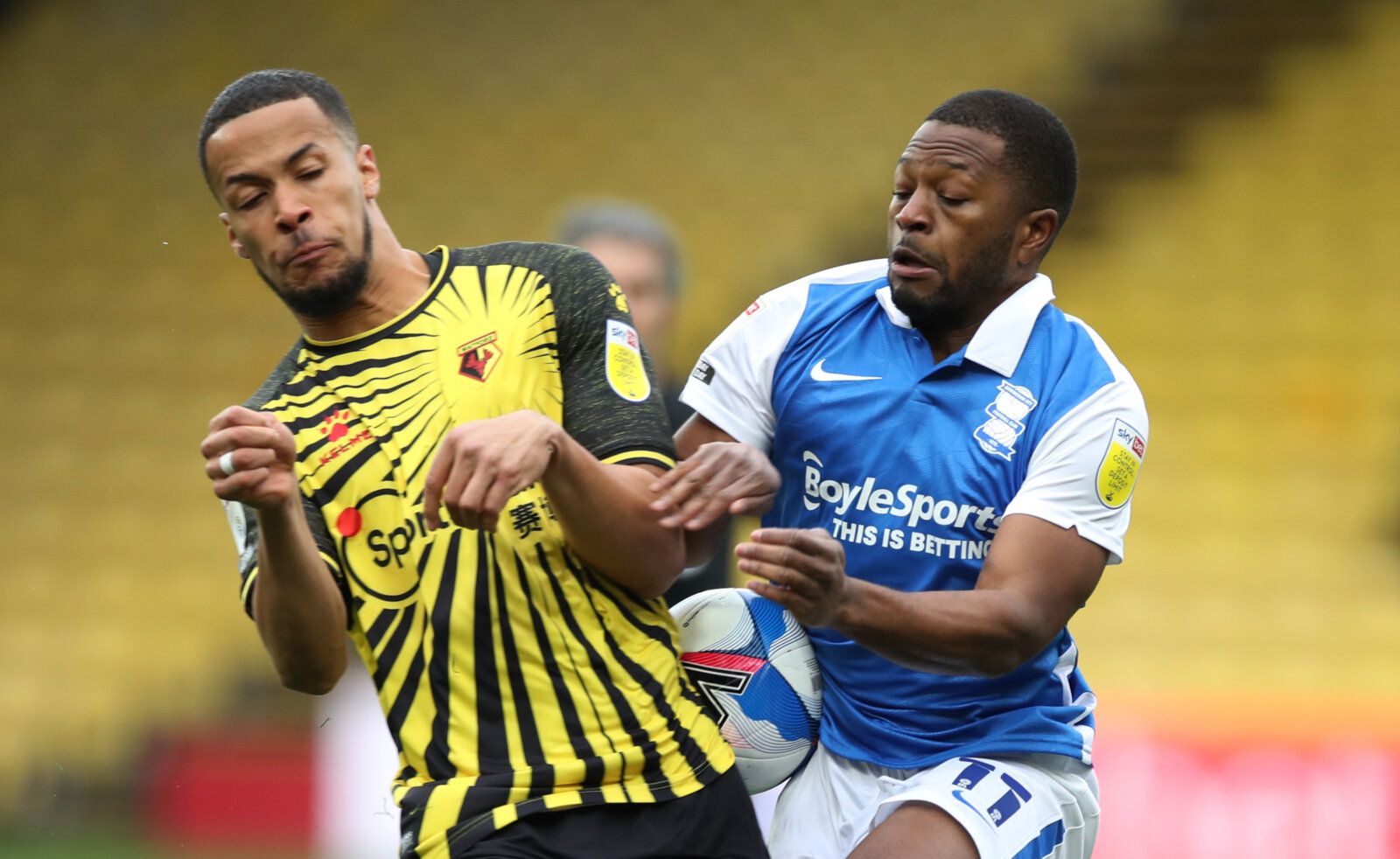 Soccer Football - Championship - Watford v Birmingham City - Vicarage Road, Watford, Britain - March 20, 2021 Watford's William Troost-Ekong in action with Birmingham City's Jeremie Bela Action Images/Peter Cziborra EDITORIAL USE ONLY. No use with unauthorized audio, video, data, fixture lists, club/league logos or 'live' services. Online in-match use limited to 75 images, no video emulation. No use in betting, games or single club /league/player publications.  Please contact your account repres