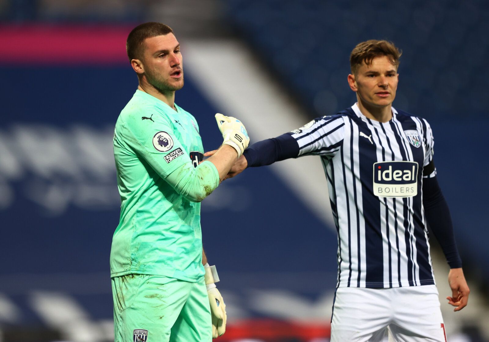 Soccer Football - Premier League - West Bromwich Albion v Southampton - The Hawthorns, West Bromwich, Britain - April 12, 2021 West Bromwich Albion's Conor Townsend with Sam Johnstone during the match Pool via REUTERS/Michael Steele EDITORIAL USE ONLY. No use with unauthorized audio, video, data, fixture lists, club/league logos or 'live' services. Online in-match use limited to 75 images, no video emulation. No use in betting, games or single club /league/player publications.  Please contact yo