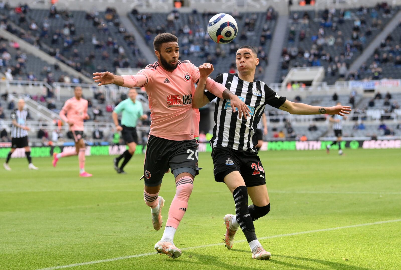 Soccer Football - Premier League - Newcastle United v Sheffield United - St James' Park, Newcastle, Britain - May 19, 2021 Newcastle United's Miguel Almiron in action with Sheffield United's Jayden Bogle Pool via REUTERS/Stu Forster EDITORIAL USE ONLY. No use with unauthorized audio, video, data, fixture lists, club/league logos or 'live' services. Online in-match use limited to 75 images, no video emulation. No use in betting, games or single club /league/player publications.  Please contact yo