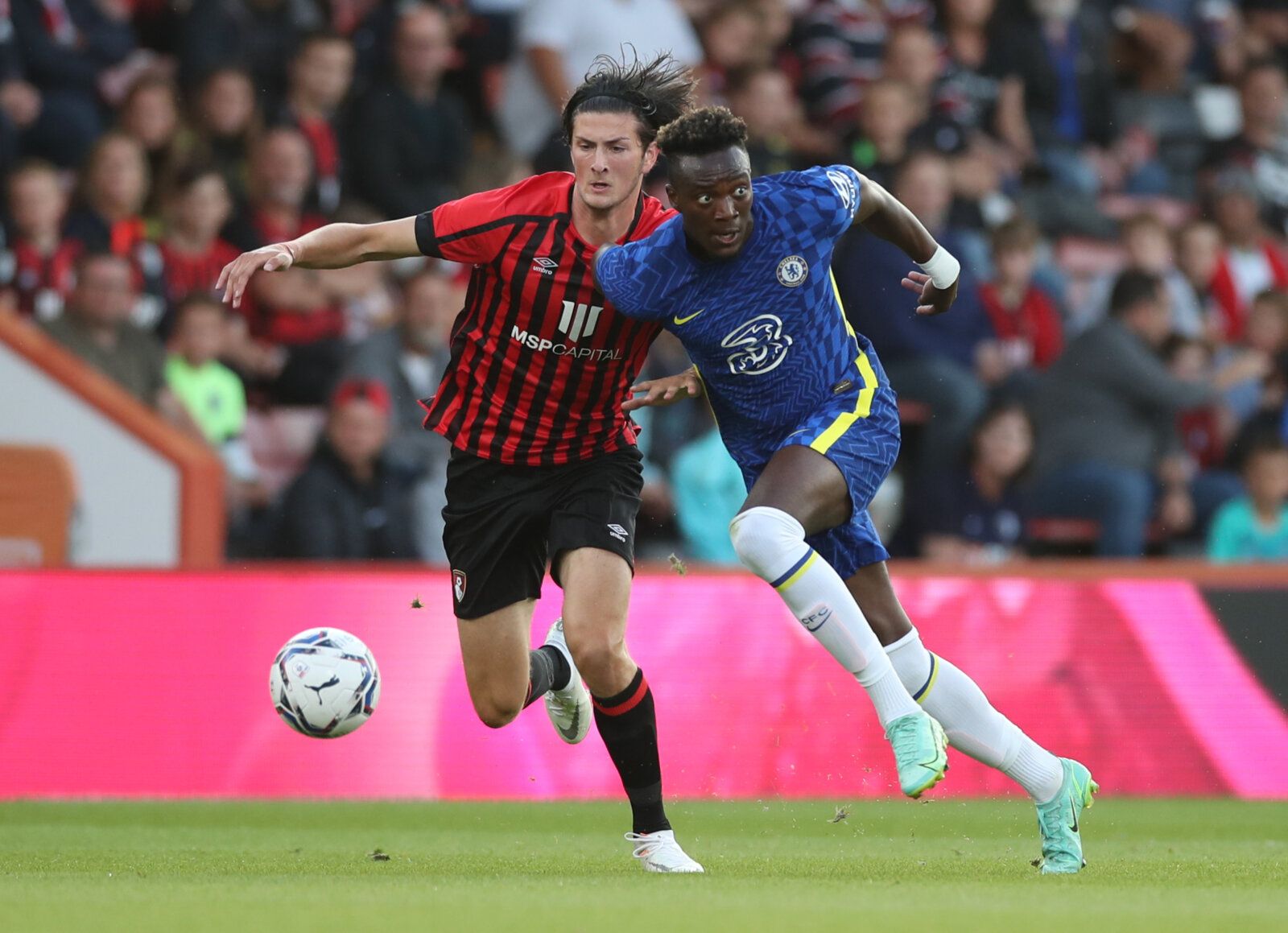 Soccer Football - Pre Season Friendly - AFC Bournemouth v Chelsea - Vitality Stadium, Bournemouth, Britain - July 27, 2021 Chelsea's Tammy Abraham in action with Bournemouth's Zeno Ibsen Rossi Action Images via Reuters/Peter Cziborra