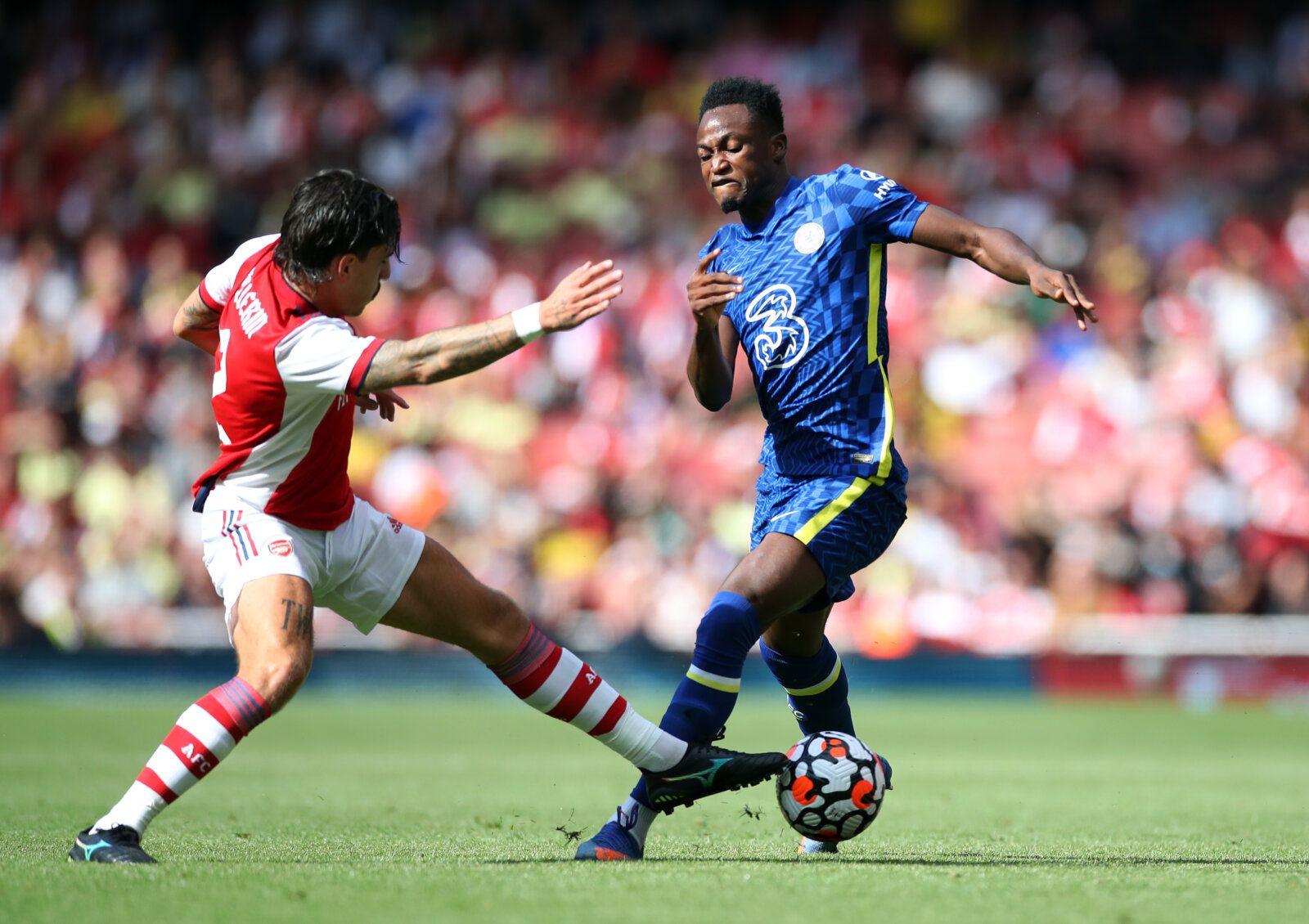 Soccer Football - Pre Season Friendly - Arsenal v Chelsea - Emirates Stadium, London, Britain - August 1, 2021 Arsenal's Hector Bellerin in action with Chelsea's Baba Rahman Action Images via Reuters/Peter Cziborra