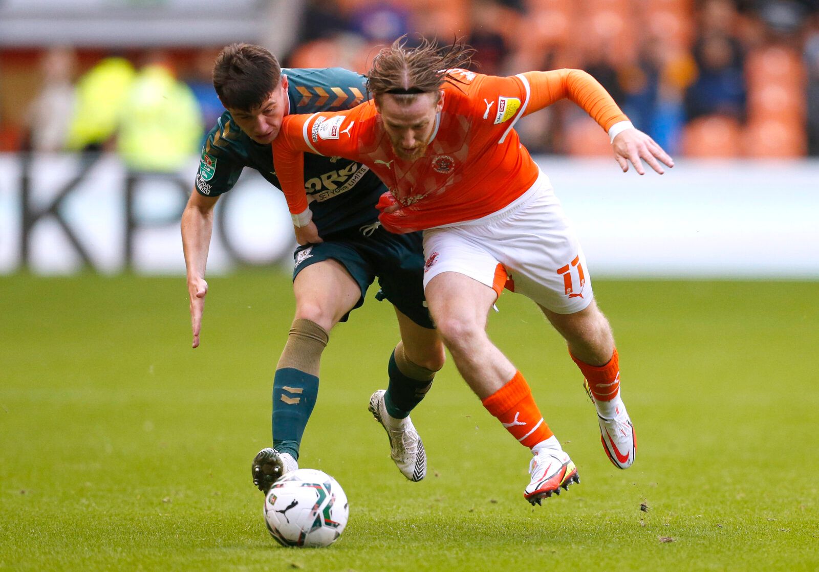 Soccer Football - Carabao Cup - First Round - Blackpool v Middlesbrough - Bloomfield Road, Blackpool, Britain - August 11, 2021  Middlesbrough's Jack Robinson in action with Blackpool's Josh Bowler Action Images/Ed Sykes EDITORIAL USE ONLY. No use with unauthorized audio, video, data, fixture lists, club/league logos or 'live' services. Online in-match use limited to 75 images, no video emulation. No use in betting, games or single club /league/player publications.  Please contact your account r
