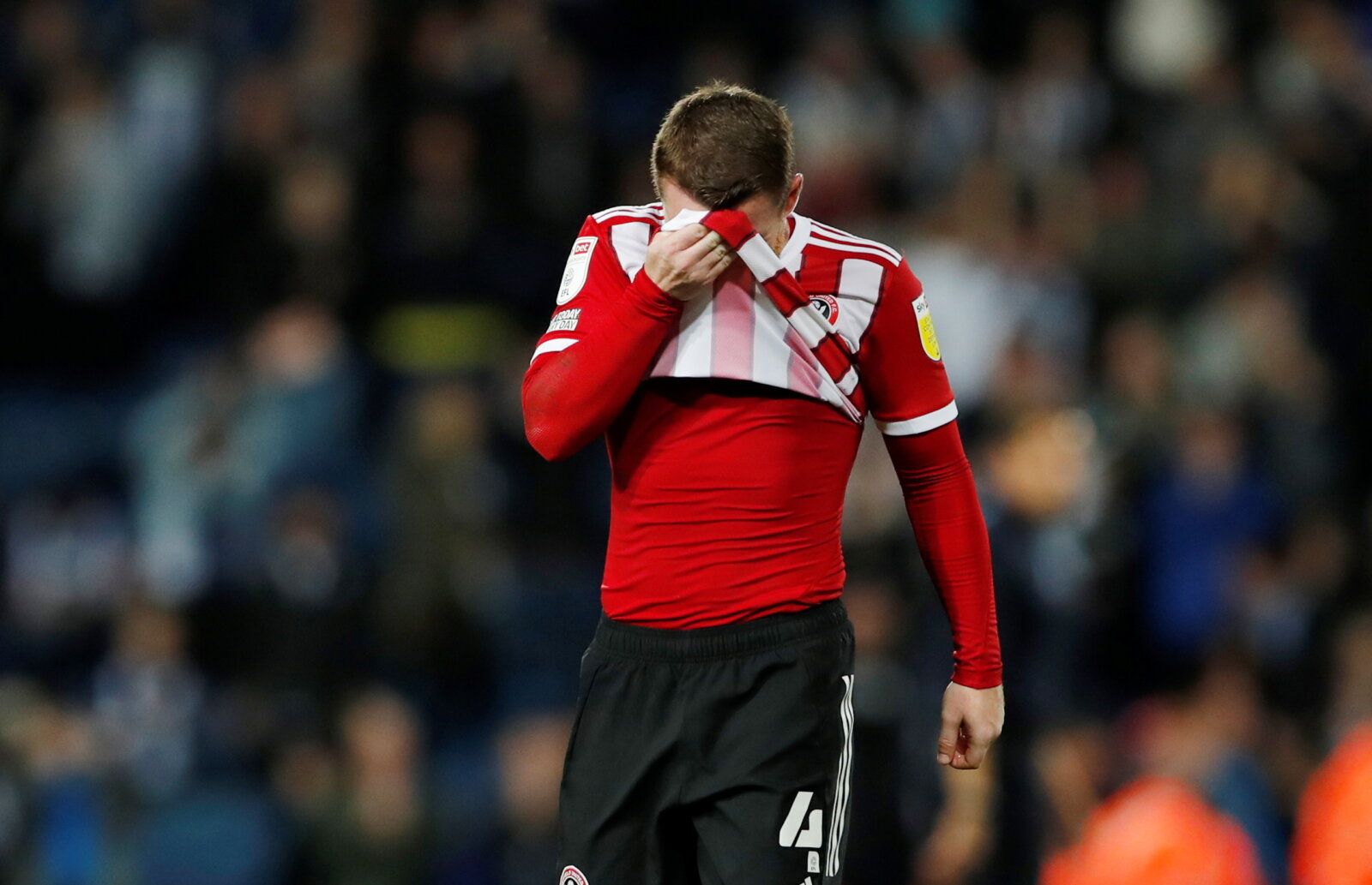 Soccer Football - Championship - West Bromwich Albion v Sheffield United - The Hawthorns, West Bromwich, Britain - August 18, 2021  Sheffield United's John Fleck looks dejected after the match     Action Images/Andrew Couldridge  EDITORIAL USE ONLY. No use with unauthorized audio, video, data, fixture lists, club/league logos or 