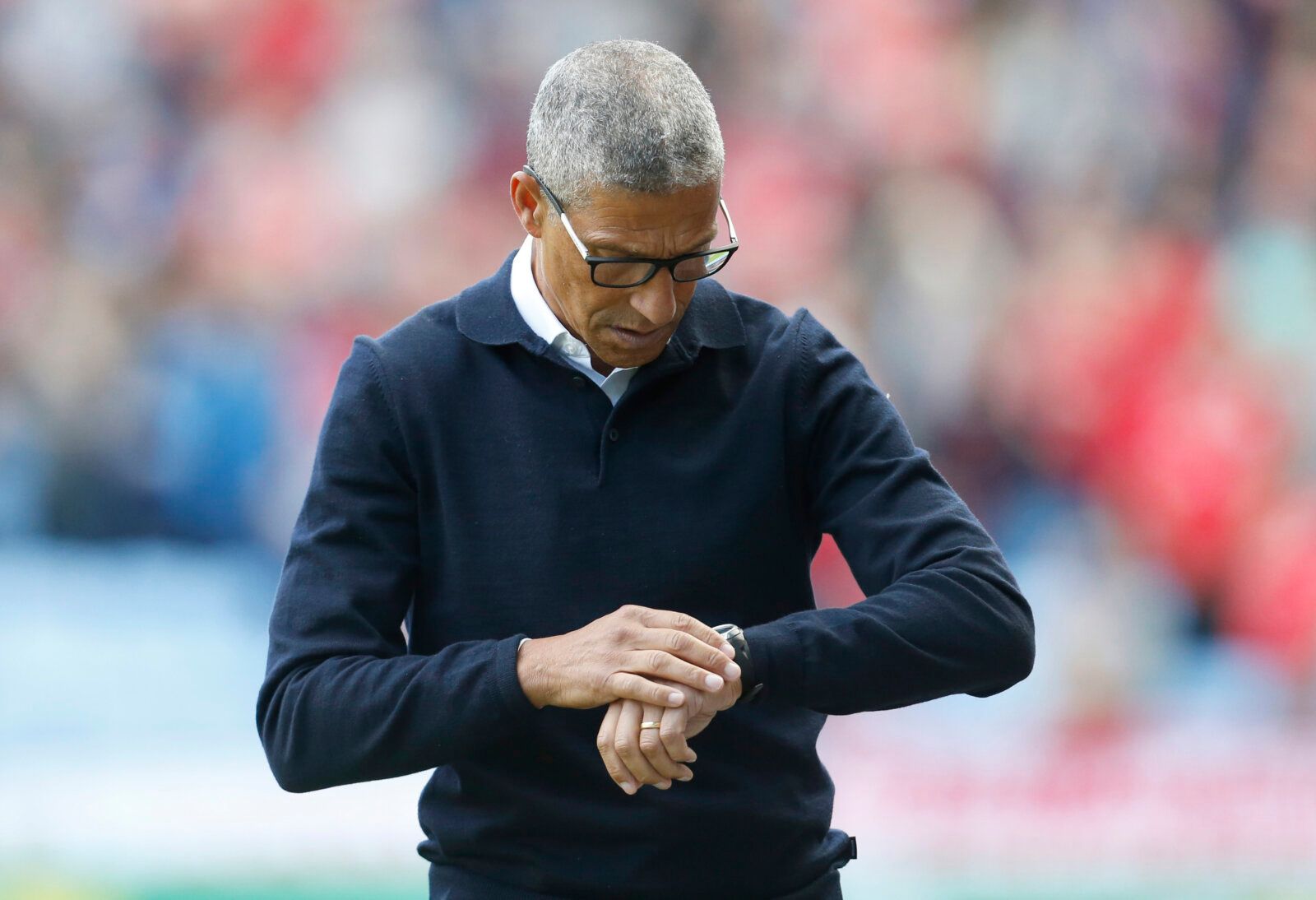 Soccer Football - Championship - Coventry City v Nottingham Forest - Coventry Building Society Arena, Coventry, Britain - August 8, 2021 Nottingham Forest manager Chris Hughton looks at his watch Action Images/Ed Sykes