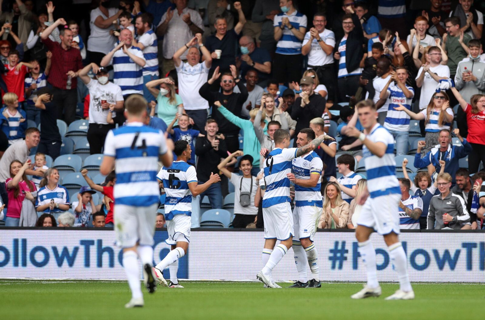 Soccer Football - Pre Season Friendly - Queens Park Rangers v Manchester United - Loftus Road. London, Britain - July 24, 2021 Queens Park Rangers' Lyndon Dykes celebrates scoring their second goal with teammates Action Images via Reuters/Peter Cziborra