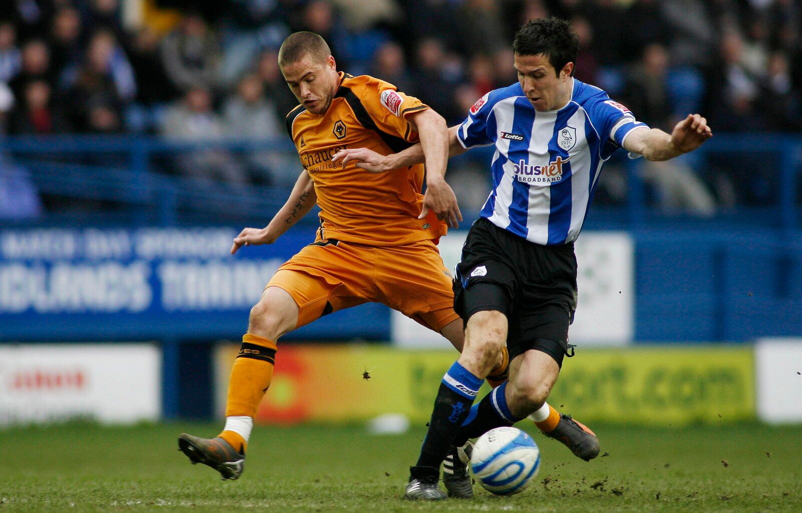 Football - Sheffield Wednesday v Wolverhampton Wanderers Coca-Cola Football League Championship - Hillsborough - 7/3/09 
Wolves' Michael Kightly (L) and Sheffield Wednesday's Richard Wood in action 
Mandatory Credit: Action Images / Craig Brough 
Livepic