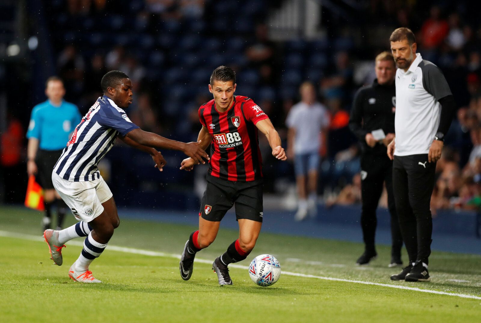 Soccer Football - Pre Season Friendly - West Bromwich Albion v AFC Bournemouth - The Hawthorns, West Bromwich, Britain - July 26, 2019   West Brom's Nathan Ferguson in action with Bournemouth's Alex Dobre as West Brom manager Slaven Bilic looks on   Action Images via Reuters/Matthew Childs