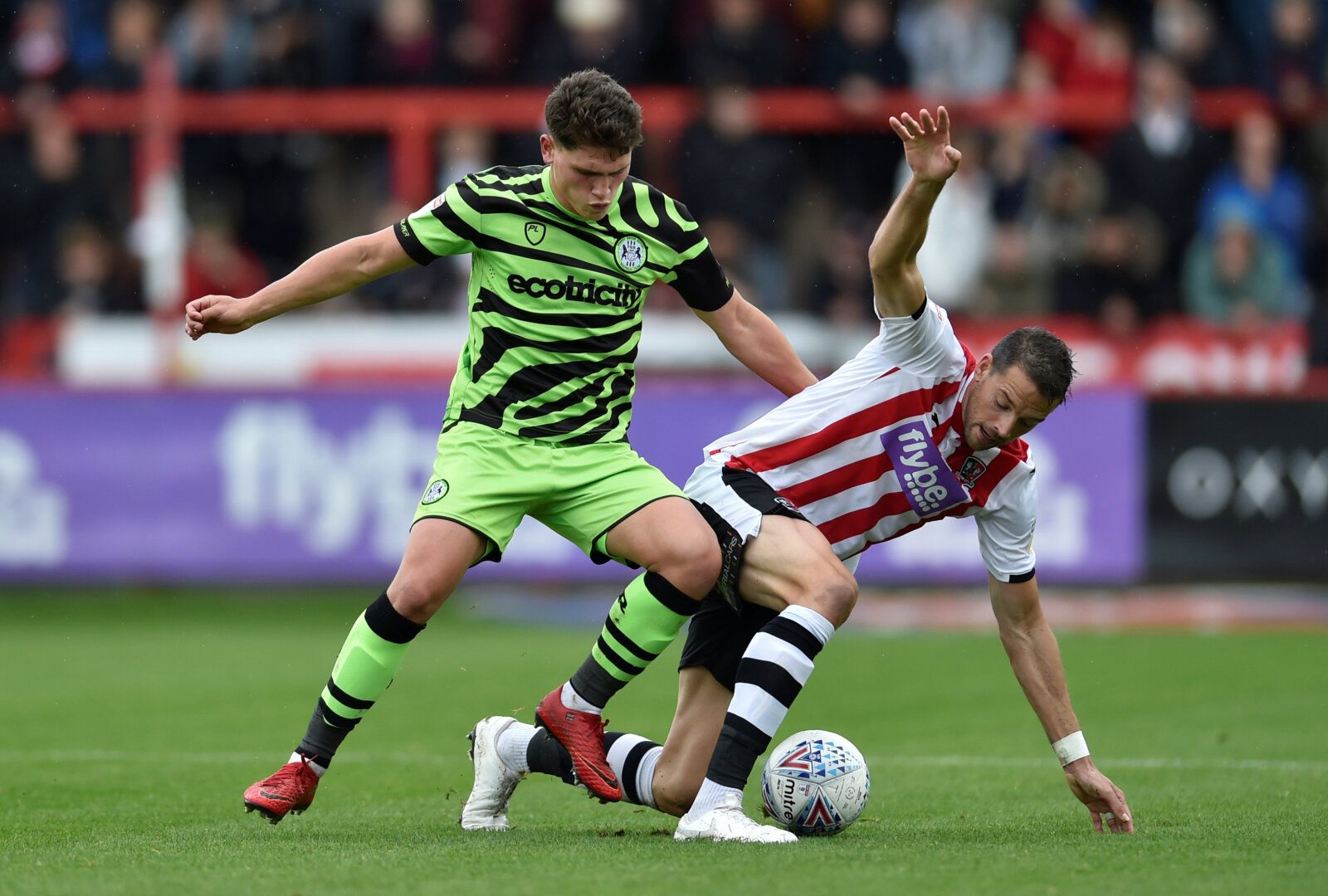Soccer Football - League Two - Exeter City v Forest Green Rovers - St James Park, Exeter, Britain - October 12, 2019  Exeter City's Aaron Martin in action with Forest Green Rovers' Matty Stevens  Action Images/Adam Holt  EDITORIAL USE ONLY. No use with unauthorized audio, video, data, fixture lists, club/league logos or 