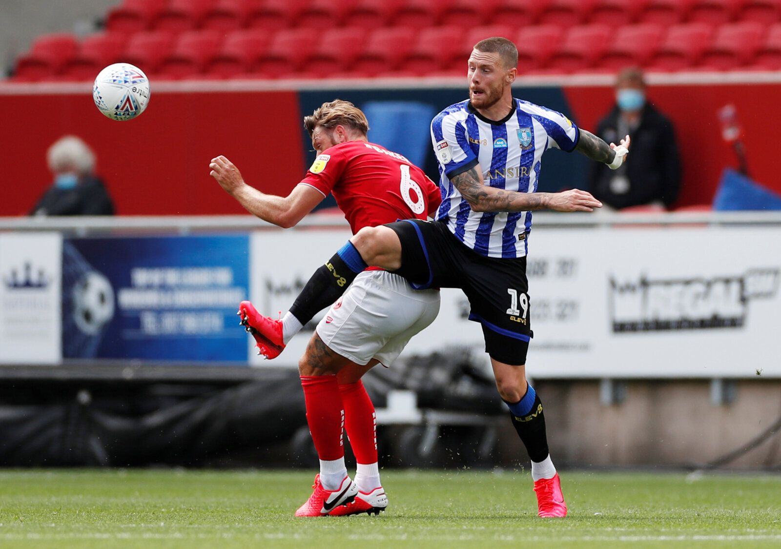 Soccer Football - Championship - Bristol City v Sheffield Wednesday - Ashton Gate Stadium, Bristol, Britain - June 28, 2020  Bristol City's Nathan Baker in action with Sheffield Wednesday's Connor Wickham, as play resumes behind closed doors following the outbreak of the coronavirus disease (COVID-19)  Action Images/Paul Childs  EDITORIAL USE ONLY. No use with unauthorized audio, video, data, fixture lists, club/league logos or 