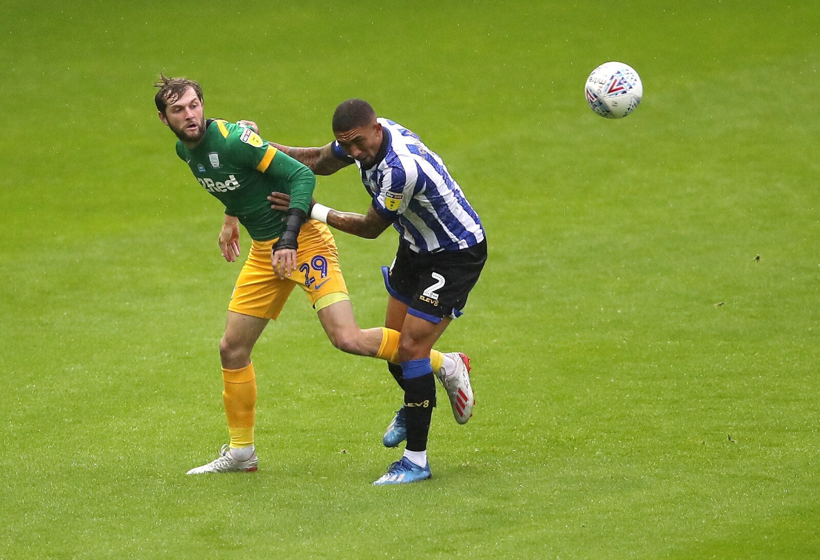 Soccer Football - Championship - Sheffield Wednesday v Preston North End - Hillsborough, Sheffield, Britain - July 8, 2020   Sheffield Wednesday's Liam Palmer in action with Preston North End's Tom Barkhuizen, as play resumes behind closed doors following the outbreak of the coronavirus disease (COVID-19)   Action Images/Molly Darlington    EDITORIAL USE ONLY. No use with unauthorized audio, video, data, fixture lists, club/league logos or 