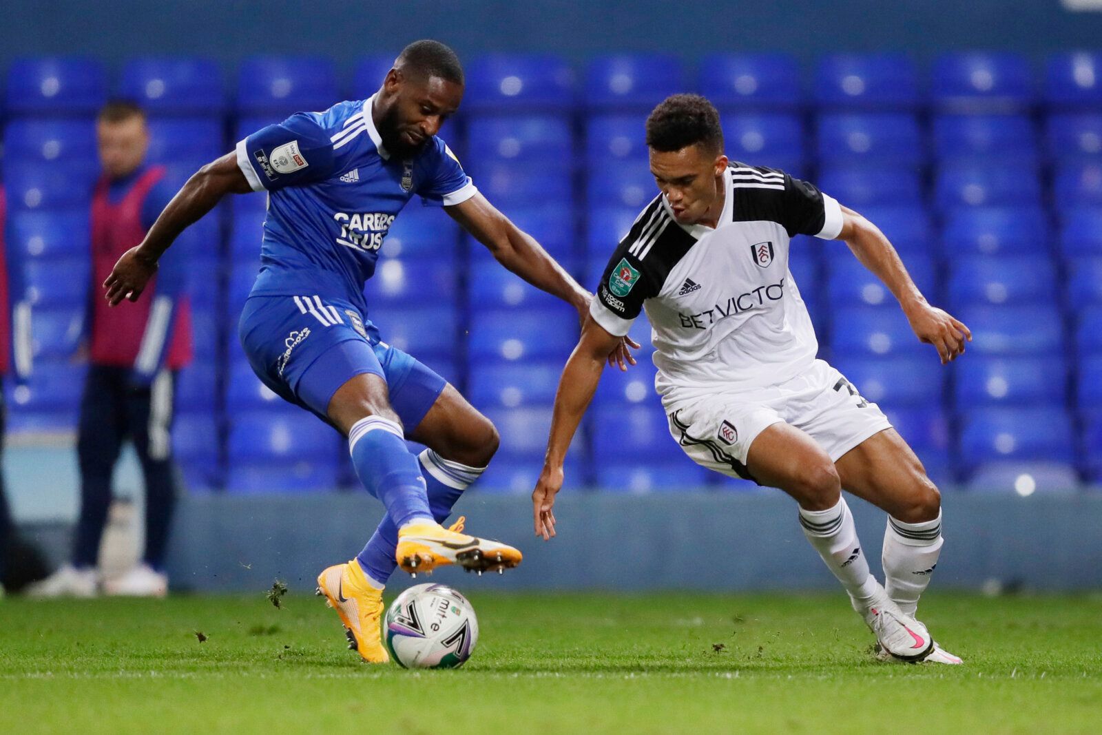 Soccer Football - Carabao Cup Second Round - Ipswich Town v Fulham - Portman Road, Ipswich, Britain - September 16, 2020. Fulham's Antonee Robinson in action with Ipswich Town's Janoi Donacien Pool via REUTERS/Kirsty Wigglesworth EDITORIAL USE ONLY. No use with unauthorized audio, video, data, fixture lists, club/league logos or 'live' services. Online in-match use limited to 75 images, no video emulation. No use in betting, games or single club/league/player publications.  Please contact your a