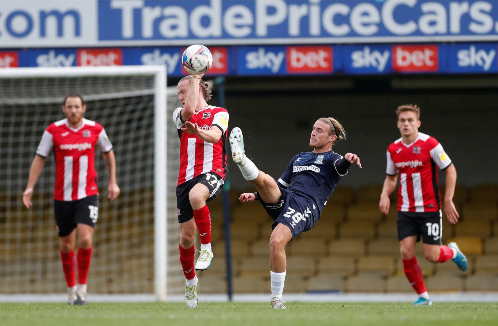 Soccer Football - League Two - Southend United v Exeter City - Roots Hall, Southend-on-Sea, Britain - October 10, 2020   Southend United’s Kyle Taylor in action with Exeter City’s Matt Jay   Action Images/Matthew Childs    EDITORIAL USE ONLY. No use with unauthorized audio, video, data, fixture lists, club/league logos or 