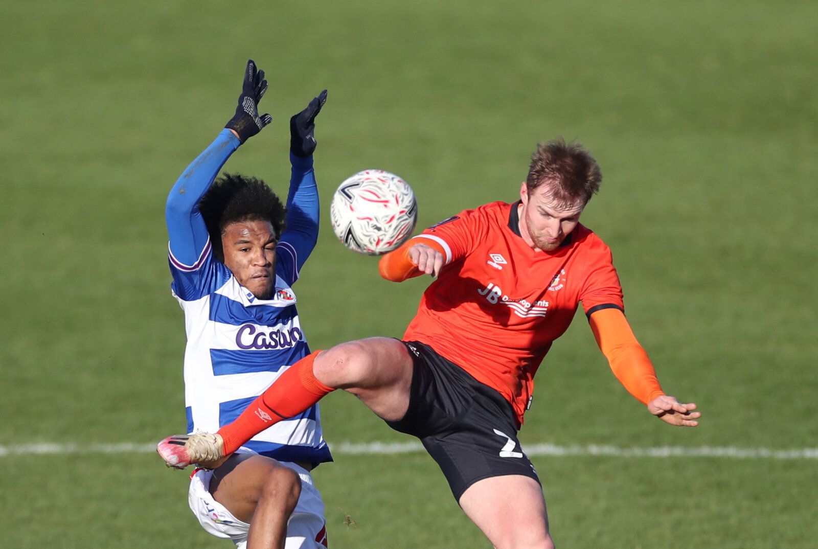 Soccer Football - FA Cup - Third Round - Luton Town v Reading - Kenilworth Road, Luton, Britain - January 9, 2021 Luton Town's James Bree in action with Reading's Jayden Onen Action Images via Reuters/Peter Cziborra