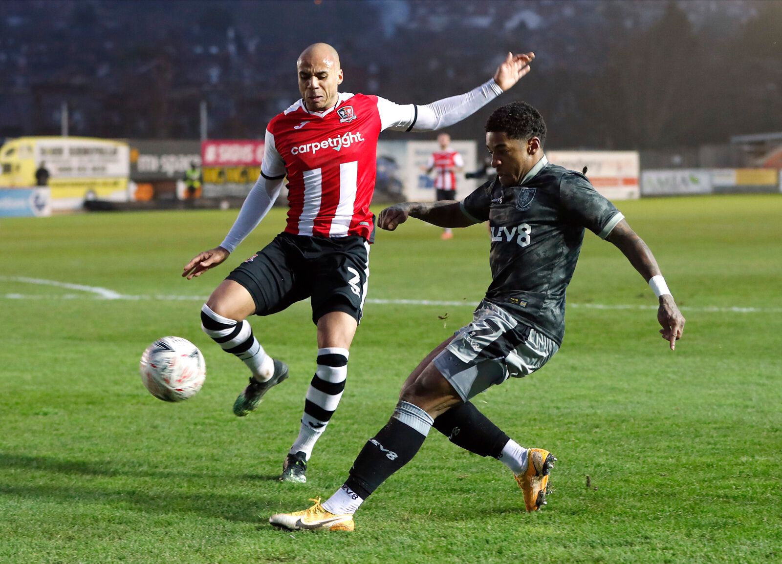 Soccer Football - FA Cup - Third Round - Exeter City v Sheffield Wednesday - St James Park, Exeter, Britain - January 9, 2021  Sheffield Wednesday's Kadeem Harris in action with Exeter City's Jake Caprice Action Images via Reuters/Paul Childs