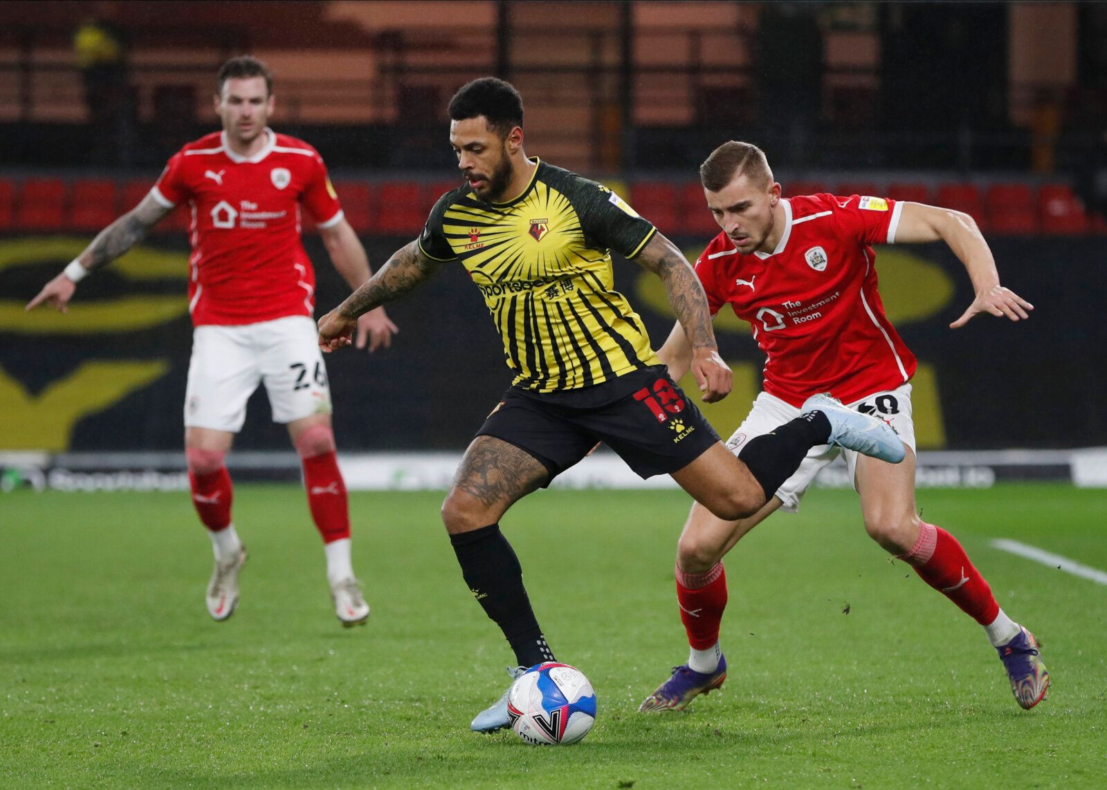 Soccer Football - Championship - Watford v Barnsley - Vicarage Road, Watford, Britain - January 19, 2021 Watford's Andre Gray in action with Barnsley's Michal Helik Action Images/Paul Childs EDITORIAL USE ONLY. No use with unauthorized audio, video, data, fixture lists, club/league logos or 'live' services. Online in-match use limited to 75 images, no video emulation. No use in betting, games or single club /league/player publications.  Please contact your account representative for further deta
