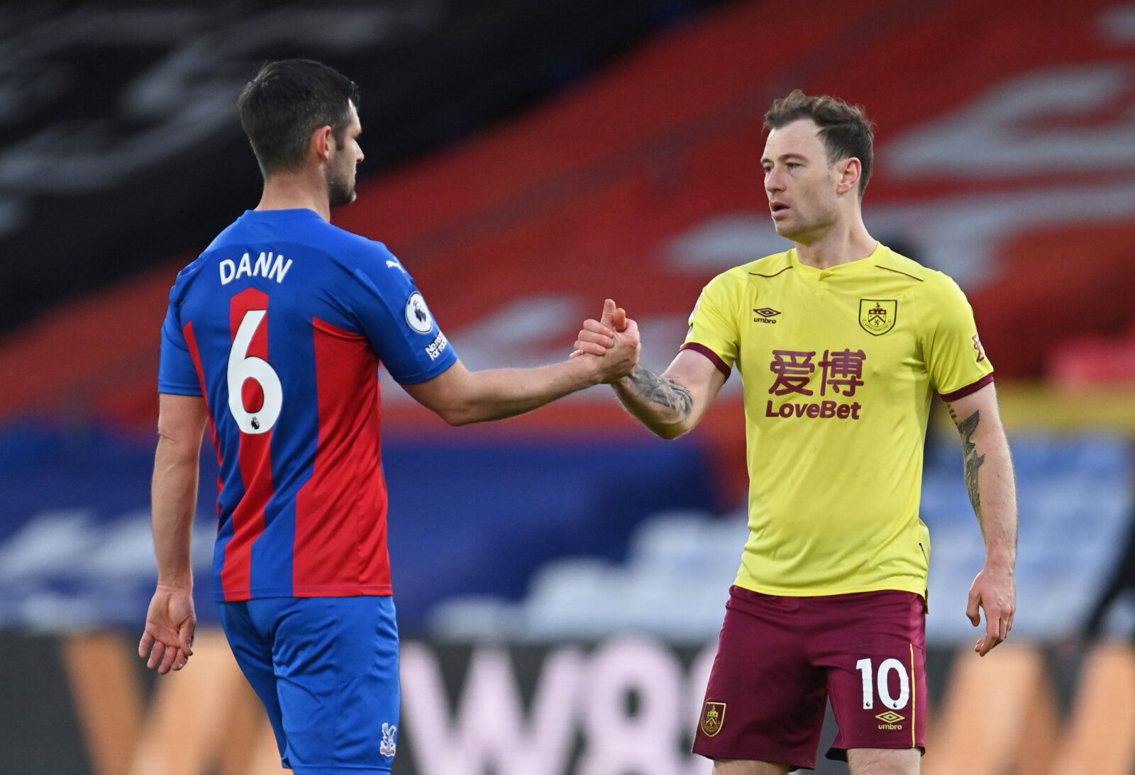 Soccer Football - Premier League - Crystal Palace v Burnley - Selhurst Park, London, Britain - February 13, 2021 Burnley's Ashley Barnes shakes hands with Crystal Palace's Scott Dann after the match Pool via REUTERS/Justin Setterfield EDITORIAL USE ONLY. No use with unauthorized audio, video, data, fixture lists, club/league logos or 'live' services. Online in-match use limited to 75 images, no video emulation. No use in betting, games or single club /league/player publications.  Please contact 