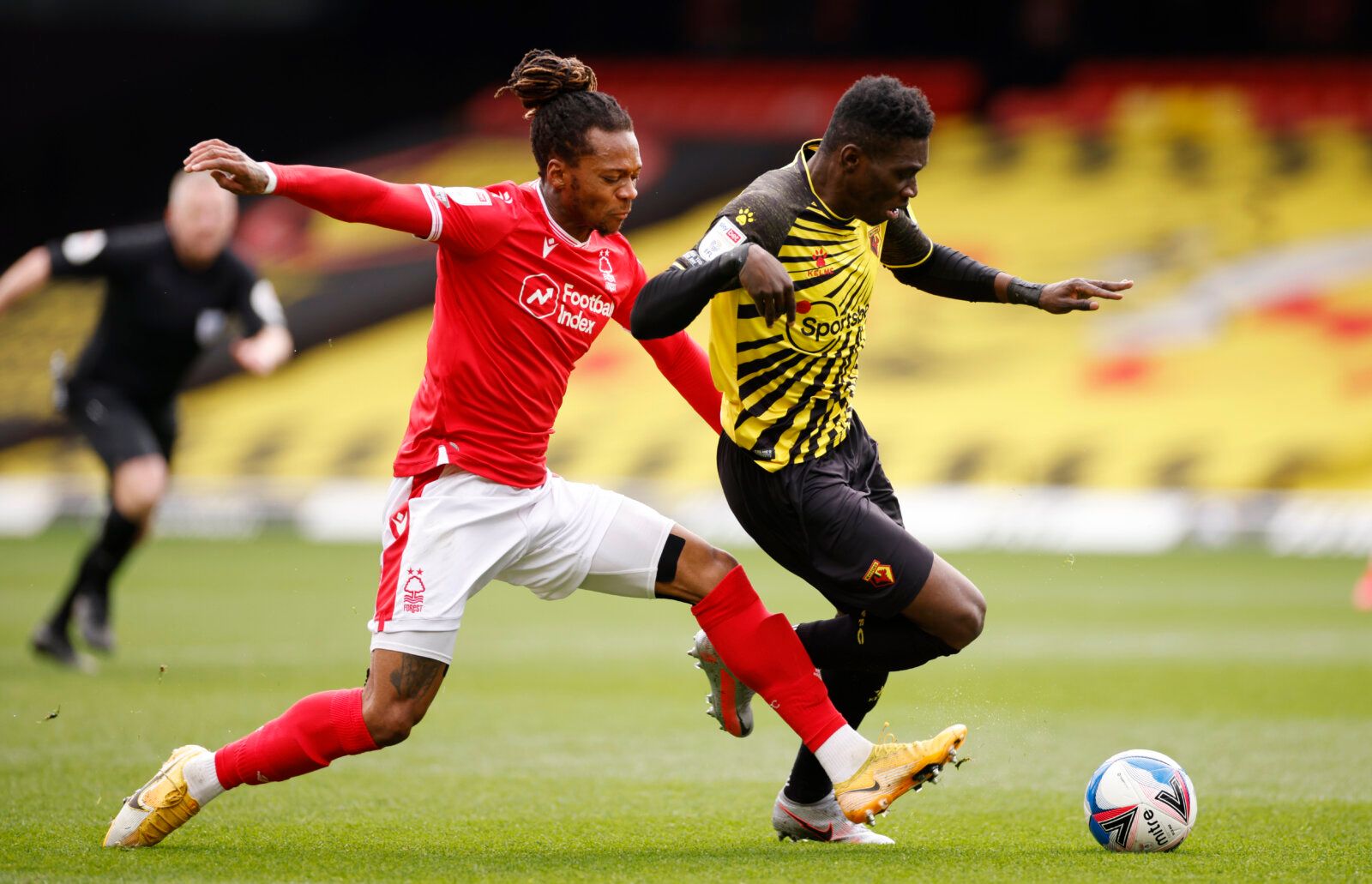 Soccer Football - Championship - Watford v Nottingham Forest - Vicarage Road, Watford, Britain - March 6, 2021 Watford's Ismaila Sarr in action with Nottingham Forest's Gaetan Bong Action Images/John Sibley EDITORIAL USE ONLY. No use with unauthorized audio, video, data, fixture lists, club/league logos or 'live' services. Online in-match use limited to 75 images, no video emulation. No use in betting, games or single club /league/player publications.  Please contact your account representative 