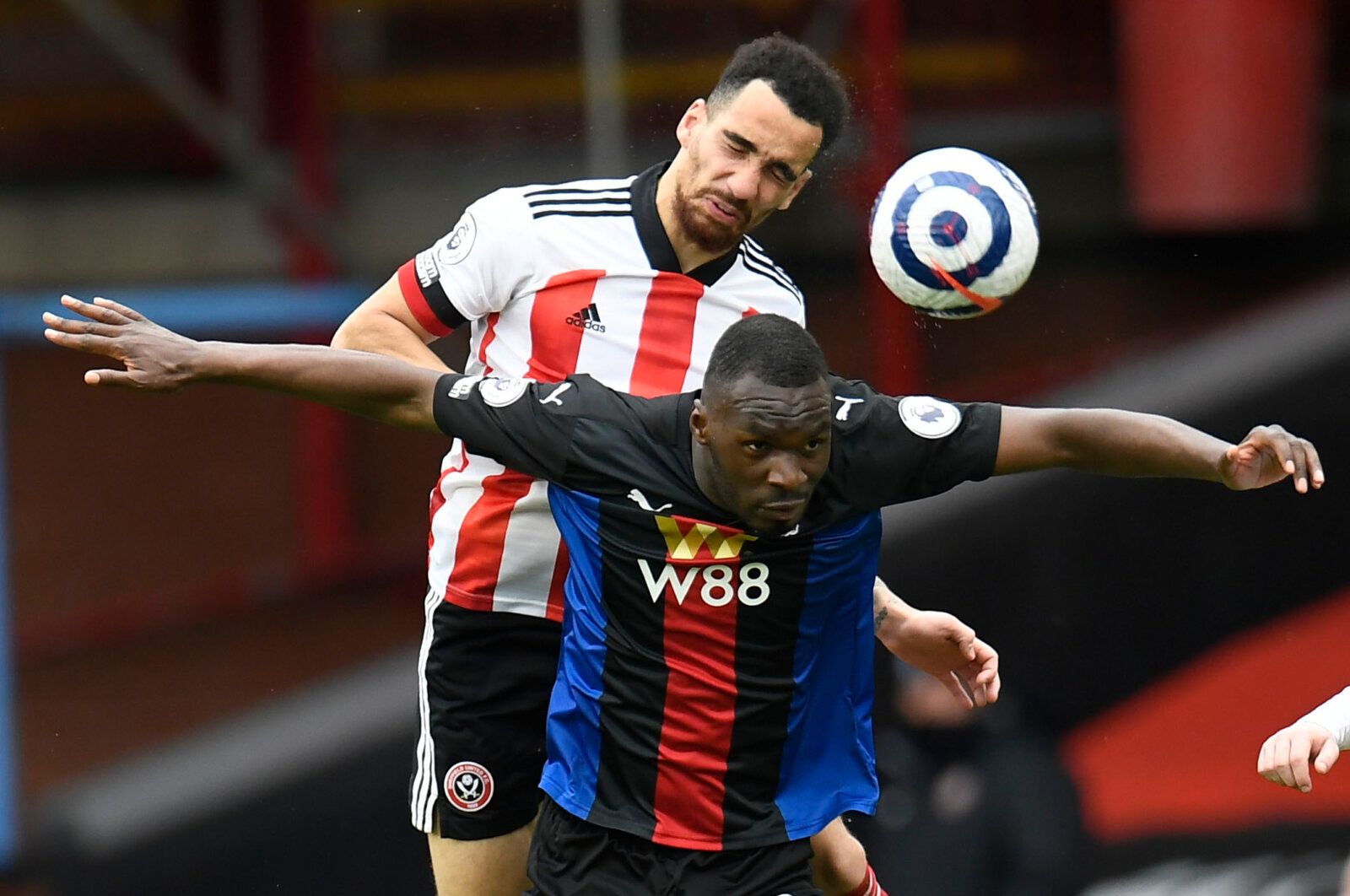 Soccer Football - Premier League - Sheffield United v Crystal Palace - Bramall Lane, Sheffield, Britain - May 8, 2021 Crystal Palace's Christian Benteke in action with Sheffield United's Kean Bryan Pool via REUTERS/Peter Powell EDITORIAL USE ONLY. No use with unauthorized audio, video, data, fixture lists, club/league logos or 'live' services. Online in-match use limited to 75 images, no video emulation. No use in betting, games or single club /league/player publications.  Please contact your ac