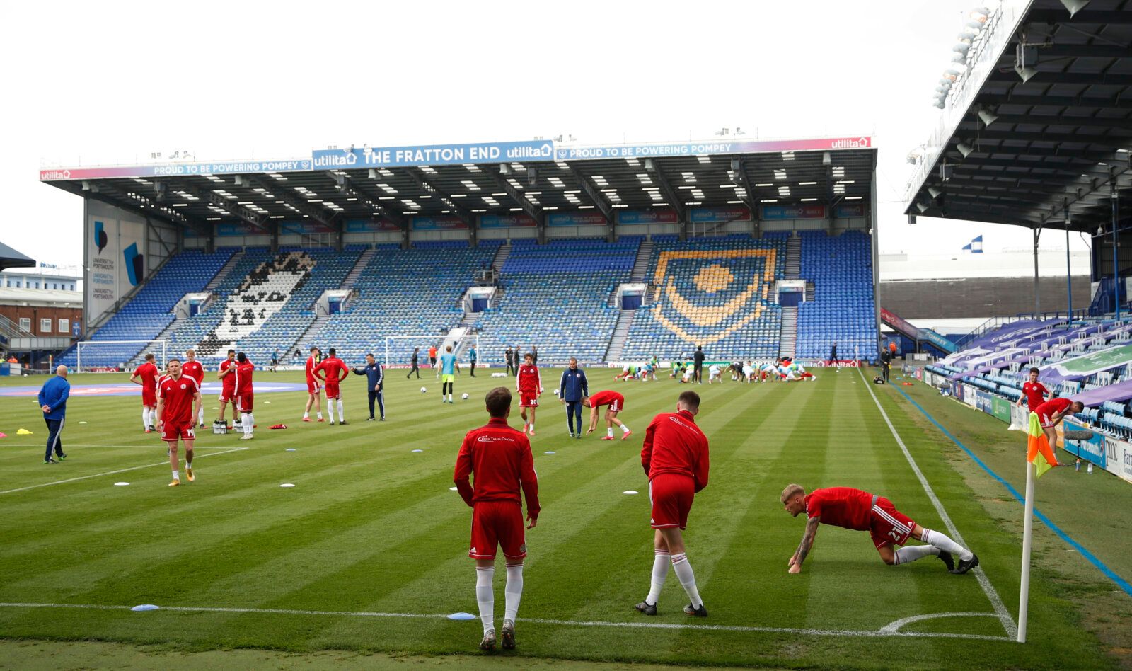 Soccer Football - League One - Portsmouth v Accrington Stanley - Fratton Park, Portsmouth, Britain - May 9, 2021 Accrington Stanley players during the warm up before the match Action Images/Andrew Boyers EDITORIAL USE ONLY. No use with unauthorized audio, video, data, fixture lists, club/league logos or 'live' services. Online in-match use limited to 75 images, no video emulation. No use in betting, games or single club /league/player publications.  Please contact your account representative for