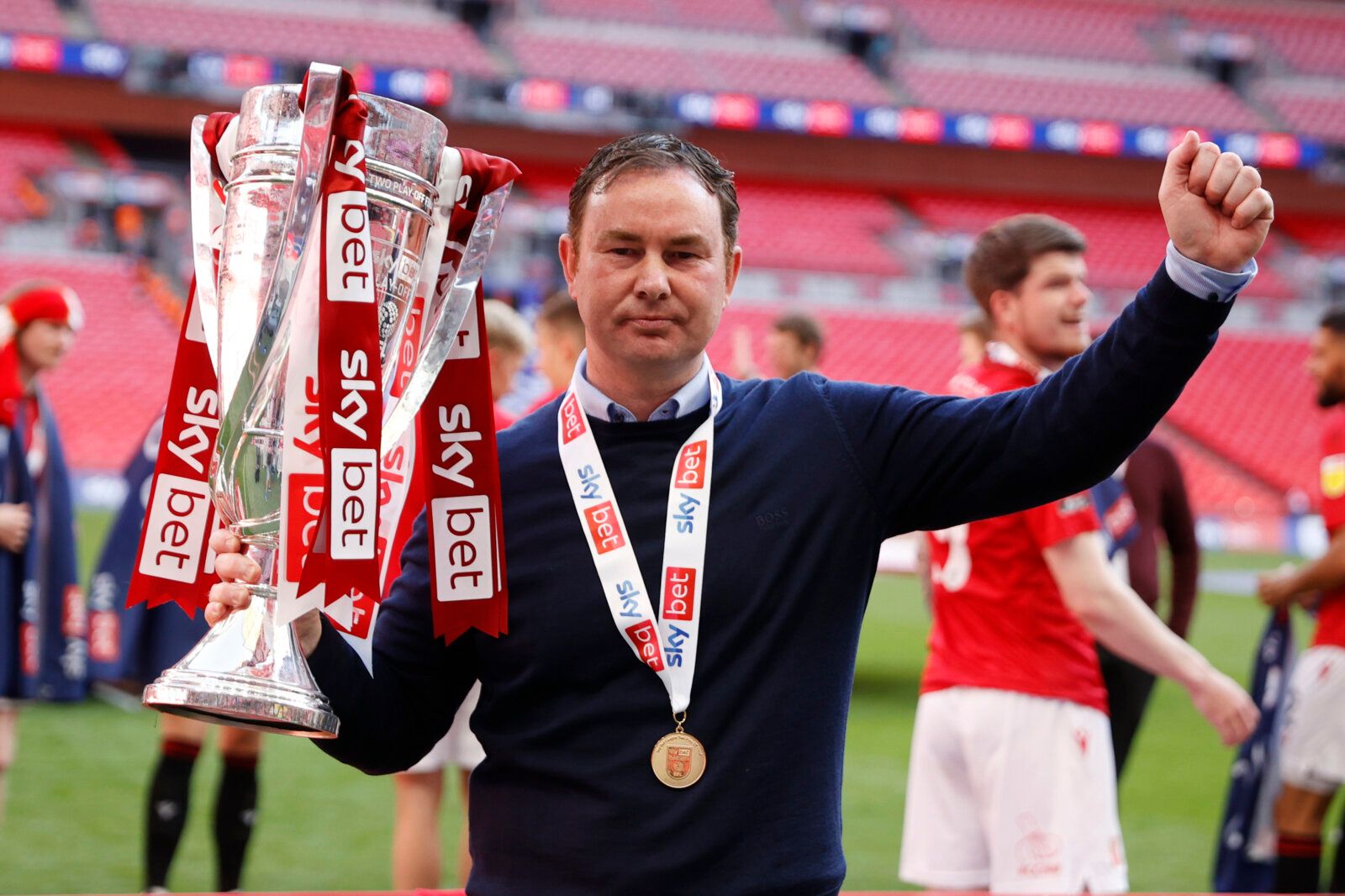 Soccer Football - League Two Play-Off Final - Morecambe v Newport County - Wembley Stadium, London, Britain - May 31, 2021 Morecambe manager Derek Adams celebrates with the trophy after winning the League Two Play-Off Final Action Images/John Sibley EDITORIAL USE ONLY. No use with unauthorized audio, video, data, fixture lists, club/league logos or 'live' services. Online in-match use limited to 75 images, no video emulation. No use in betting, games or single club /league/player publications.  