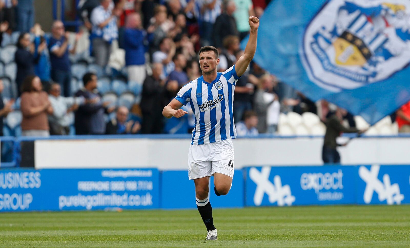 Soccer Football - Championship - Huddersfield Town v Fulham - John Smith's Stadium, Huddersfield, Britain - August 14, 2021 Huddersfield Town's Matty Pearson celebrates scoring their first goal Action Images/Craig Brough EDITORIAL USE ONLY. No use with unauthorized audio, video, data, fixture lists, club/league logos or 'live' services. Online in-match use limited to 75 images, no video emulation. No use in betting, games or single club /league/player publications.  Please contact your account r