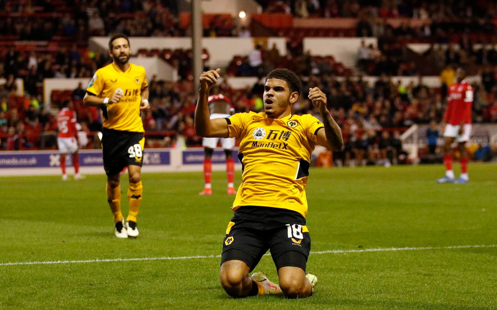 Soccer - England - Carabao Cup Second Round - Nottingham Forest v Wolverhampton Wanderers - The City Ground, Nottingham, Britain - August 24, 2021 Wolverhampton Wanderers' Morgan Gibbs-White celebrates scoring their fourth goal Action Images via Reuters/Andrew Boyers