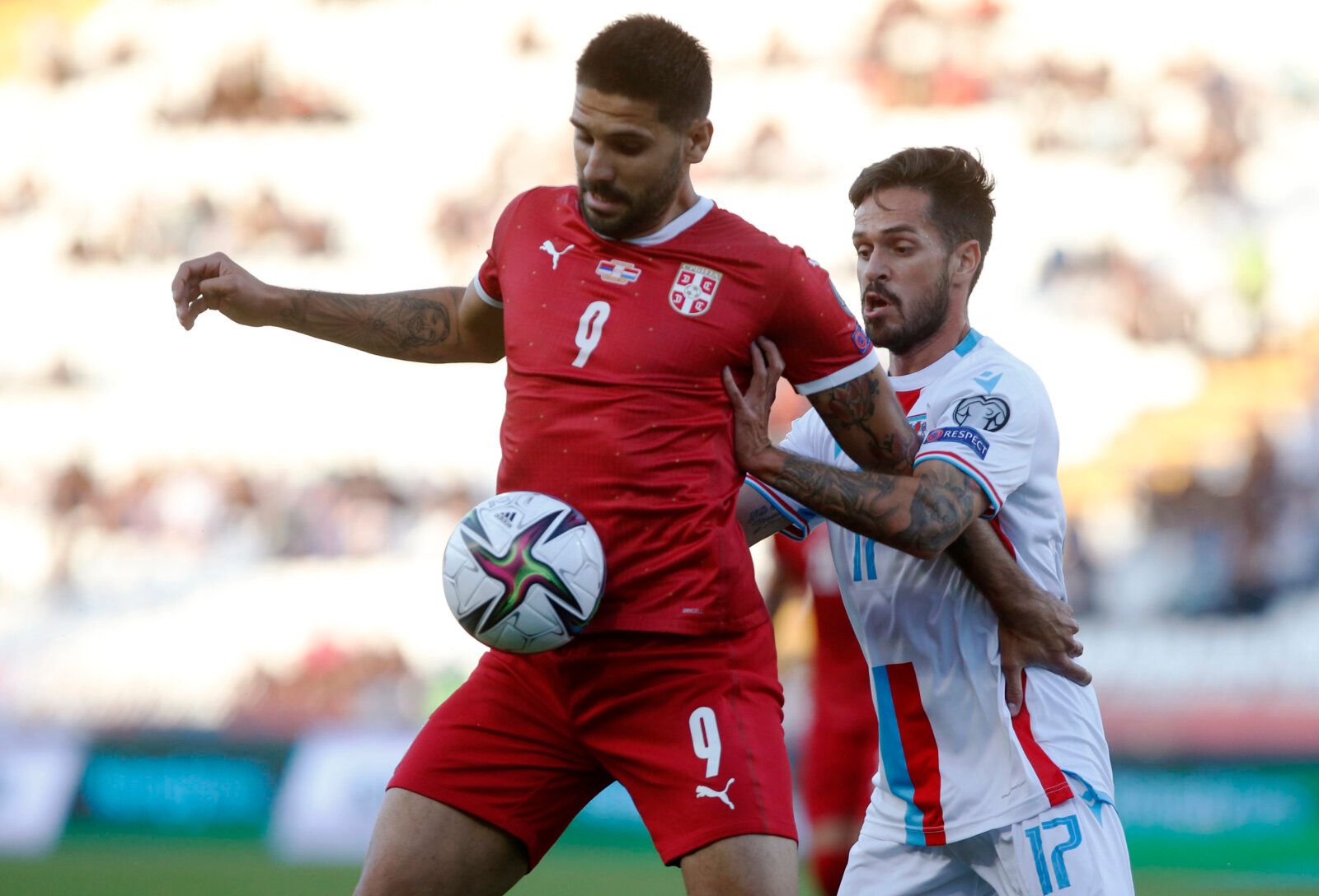 Soccer Football - World Cup - UEFA Qualifiers - Group A - Serbia v Luxembourg - Rajko Mitic Stadium, Belgrade, Serbia - September 4, 2021 Serbia's Aleksandar Mitrovic in action with Luxembourg's Mica Pinto REUTERS/Novak Djurovic