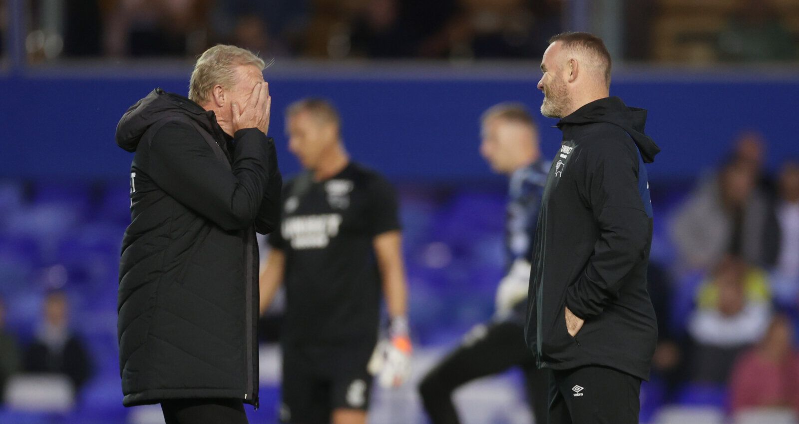 Soccer Football - Championship - Birmingham City v Derby County - St Andrew's, Birmingham, Britain - September 10, 2021 Derby County manager Wayne Rooney and Steve McClaren after the match Action Images/Carl Recine EDITORIAL USE ONLY. No use with unauthorized audio, video, data, fixture lists, club/league logos or 'live' services. Online in-match use limited to 75 images, no video emulation. No use in betting, games or single club /league/player publications.  Please contact your account represe