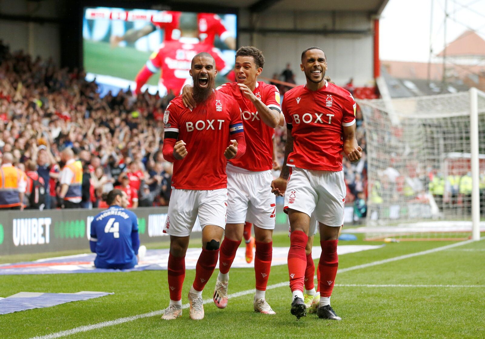 Soccer Football - Championship - Nottingham Forest v Cardiff City - The City Ground, Nottingham, Britain - September 12, 2021  Nottingham Forest's Lewis Grabban celebrates scoring their first goal with teammates  Action Images/Ed Sykes