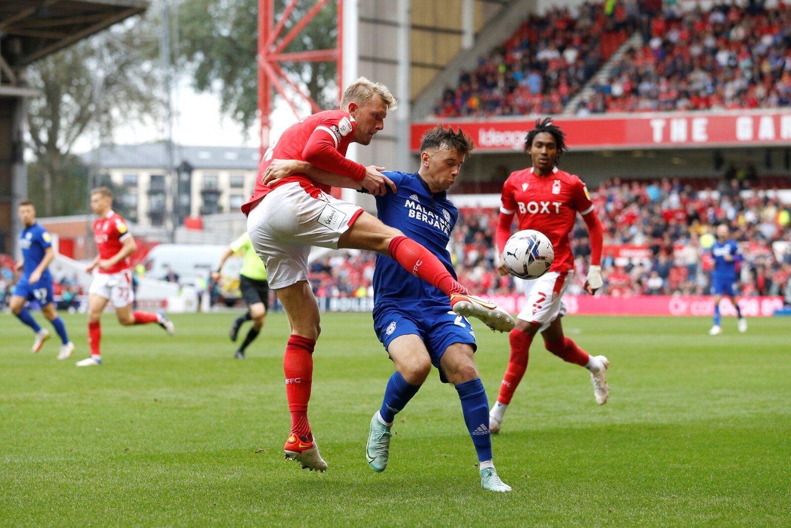 Soccer Football - Championship - Nottingham Forest v Cardiff City - The City Ground, Nottingham, Britain - September 12, 2021  Nottingham Forest's Joe Worrall in action with Cardiff City's Mark Harris    Action Images/Ed Sykes