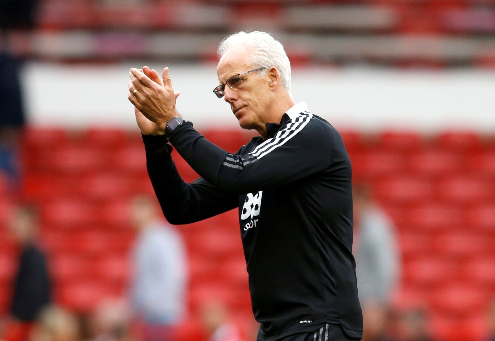 Soccer Football - Championship - Nottingham Forest v Cardiff City - The City Ground, Nottingham, Britain - September 12, 2021  Cardiff City manager Mick McCarthy applauds the fans after the match      Action Images/Ed Sykes