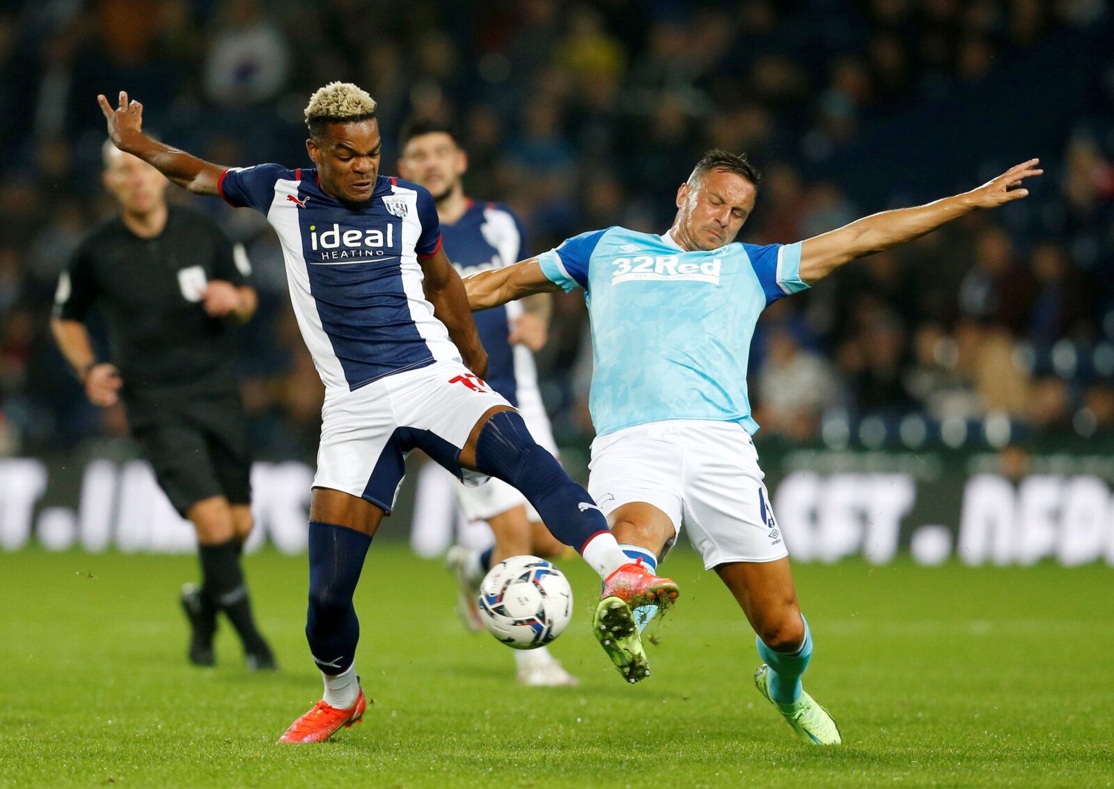 Soccer Football - Championship - West Bromwich Albion v Derby County - The Hawthorns, West Bromwich, Britain - September 14, 2021 West Bromwich Albion's Grady Diangana in action with Derby County's Phil Jagielka  Action Images/Ed Sykes