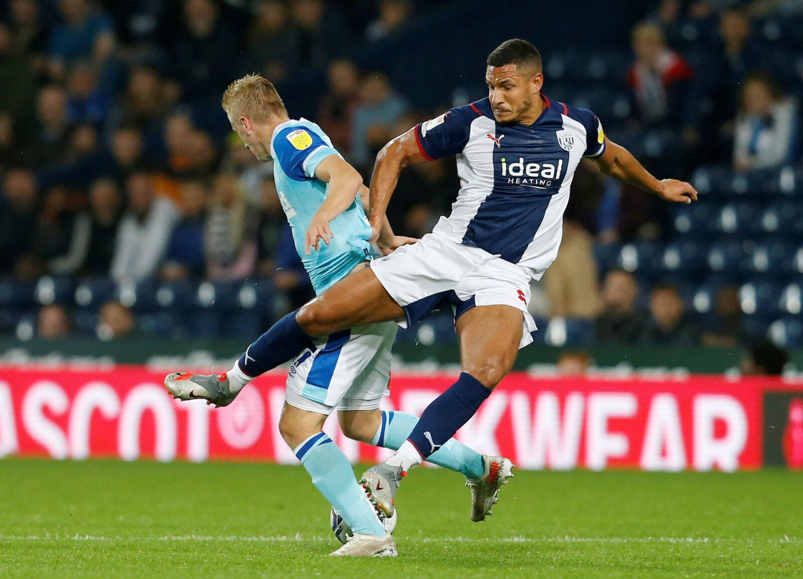 Soccer Football - Championship - West Bromwich Albion v Derby County - The Hawthorns, West Bromwich, Britain - September 14, 2021 Derby County's Louie Sibley in action with West Bromwich Albion's Jake Livermore  Action Images/Ed Sykes