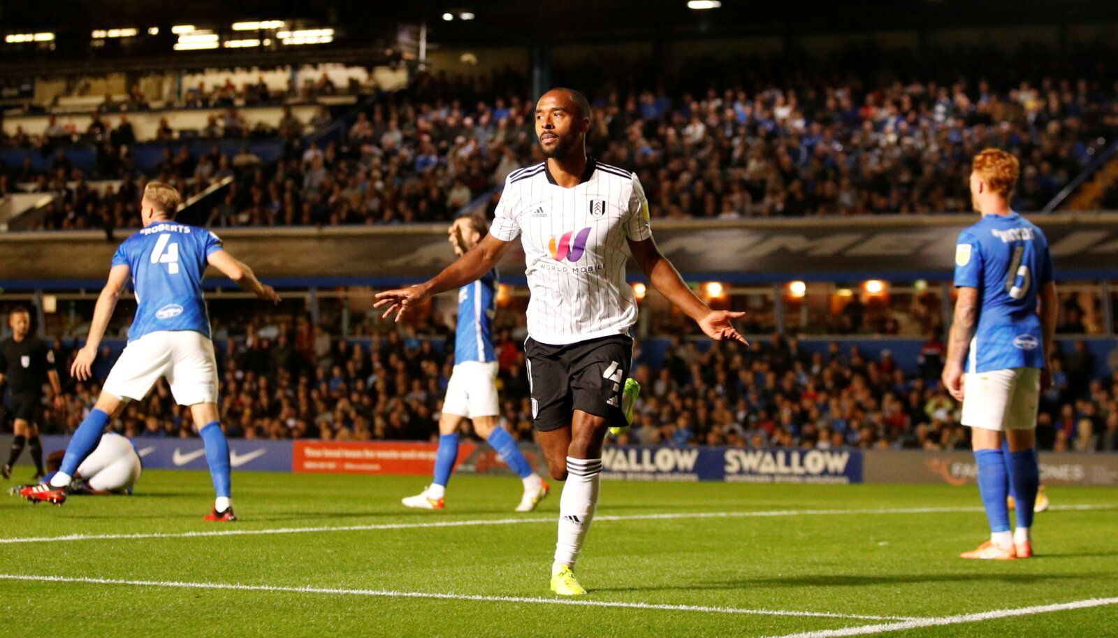Soccer Football - Championship - Birmingham City v Fulham - St Andrew's, Birmingham, Britain - September 15, 2021  Fulham's Denis Odoi celebrates after scoring their first goal Action Images/Andrew Boyers  EDITORIAL USE ONLY. No use with unauthorized audio, video, data, fixture lists, club/league logos or 