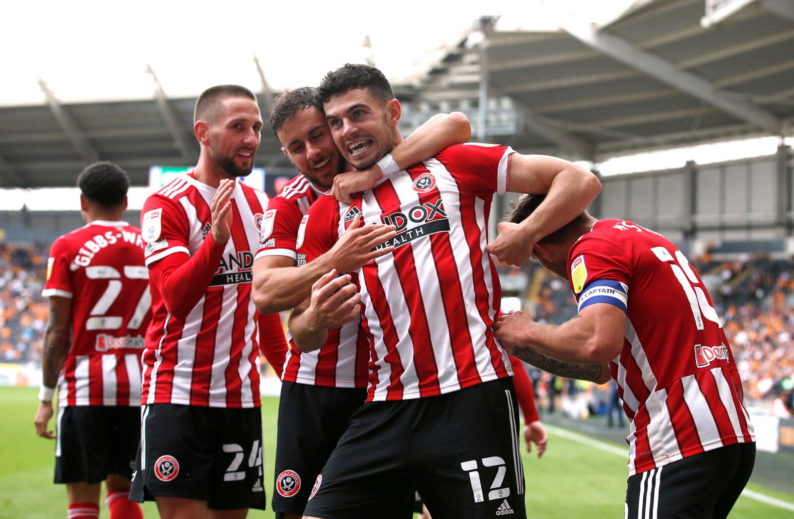 Soccer Football - Championship - Hull City v Sheffield United - KCOM Stadium, Hull, Britain - September 18, 2021 Sheffield United's John Egan celebrates scoring their second goal with teammates Action Images/Ed Sykes EDITORIAL USE ONLY. No use with unauthorized audio, video, data, fixture lists, club/league logos or 'live' services. Online in-match use limited to 75 images, no video emulation. No use in betting, games or single club /league/player publications.  Please contact your account repre