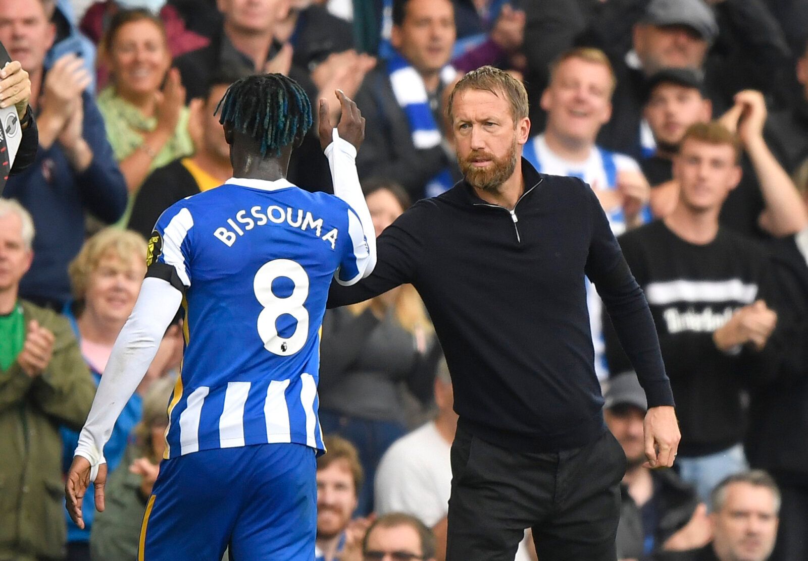 Soccer Football - Premier League - Brighton &amp; Hove Albion v Leicester City - The American Express Community Stadium, Brighton, Britain - September 19, 2021 Brighton &amp; Hove Albion's Yves Bissouma shakes hands with manager Graham Potter as he is substituted REUTERS/Toby Melville EDITORIAL USE ONLY. No use with unauthorized audio, video, data, fixture lists, club/league logos or 'live' services. Online in-match use limited to 75 images, no video emulation. No use in betting, games or single