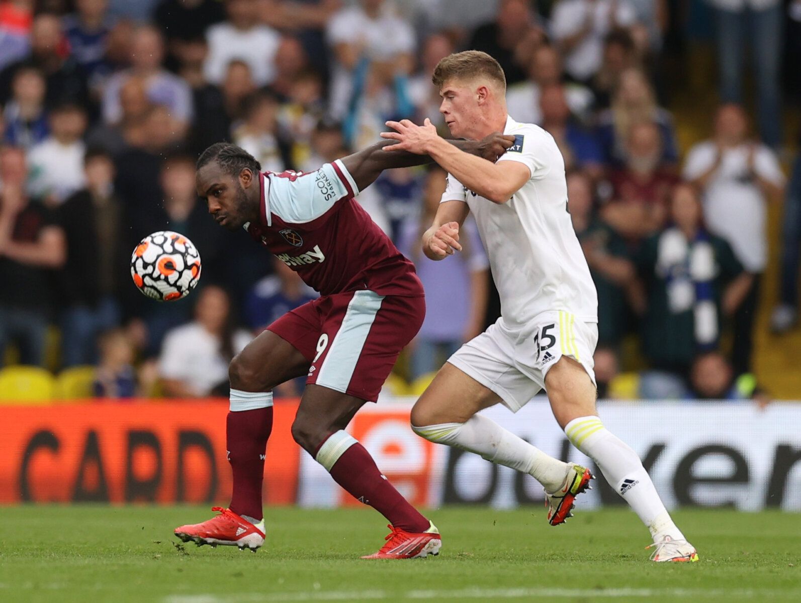 Soccer Football - Premier League - Leeds United v West Ham United - Elland Road, Leeds, Britain - September 25, 2021  West Ham United's Michail Antonio in action with Leeds United's Charlie Cresswell Action Images via Reuters/Lee Smith EDITORIAL USE ONLY. No use with unauthorized audio, video, data, fixture lists, club/league logos or 'live' services. Online in-match use limited to 75 images, no video emulation. No use in betting, games or single club /league/player publications.  Please contact