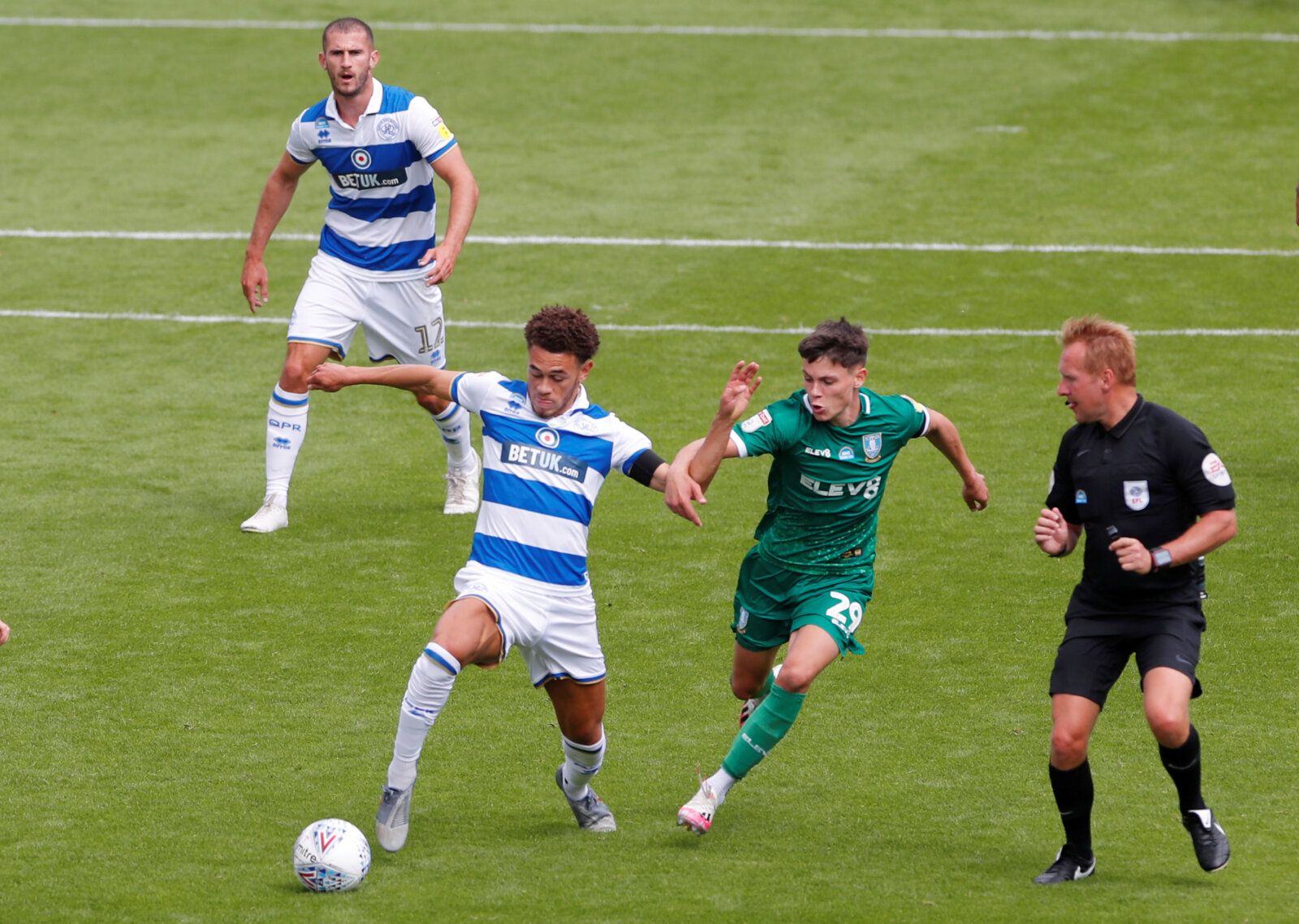 Soccer Football - Championship - Queens Park Rangers v Sheffield Wednesday - Loftus Park, London, Britain - July 11, 2020   Queens Park Rangers' Luke Amos in action with Sheffield Wednesday's Alex Hunt, as play resumes behind closed doors following the outbreak of the coronavirus disease (COVID-19)   Action Images/Andrew Couldridge    EDITORIAL USE ONLY. No use with unauthorized audio, video, data, fixture lists, club/league logos or "live" services. Online in-match use limited to 75 images, no 