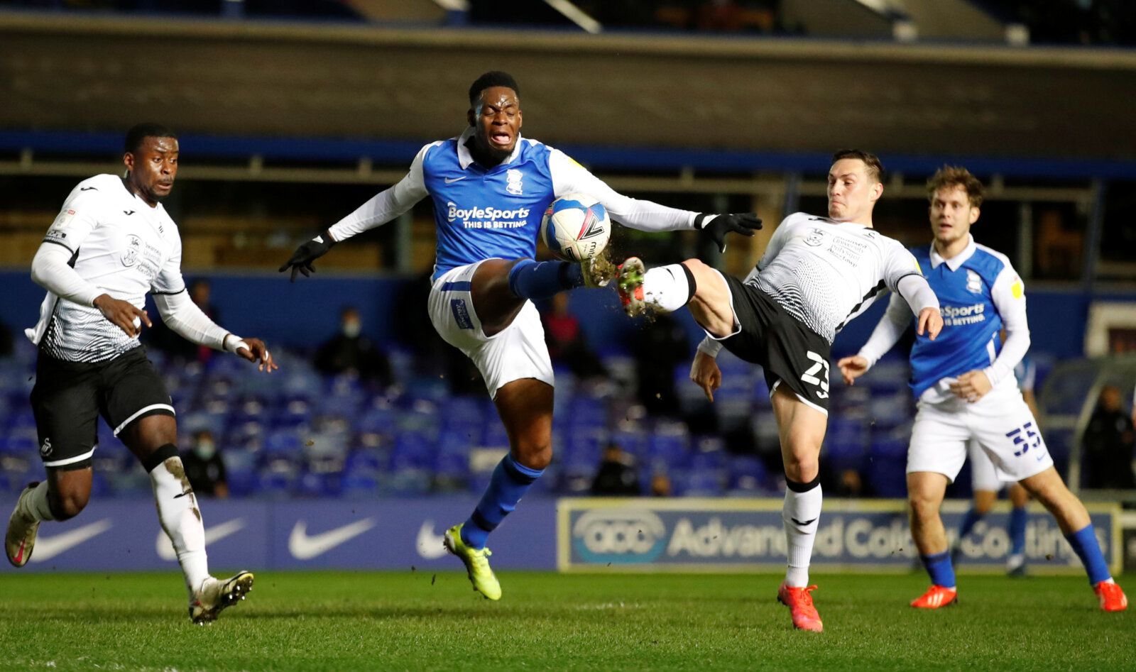 Soccer Football - Championship - Birmingham City v Swansea City - St Andrew's, Birmingham, Britain - April 2, 2021  Swansea City's Connor Roberts concedes a penalty against Birmingham City's Jonathan Leko  Action Images/Andrew Boyers  EDITORIAL USE ONLY. No use with unauthorized audio, video, data, fixture lists, club/league logos or "live" services. Online in-match use limited to 75 images, no video emulation. No use in betting, games or single club/league/player publications.  Please contact y