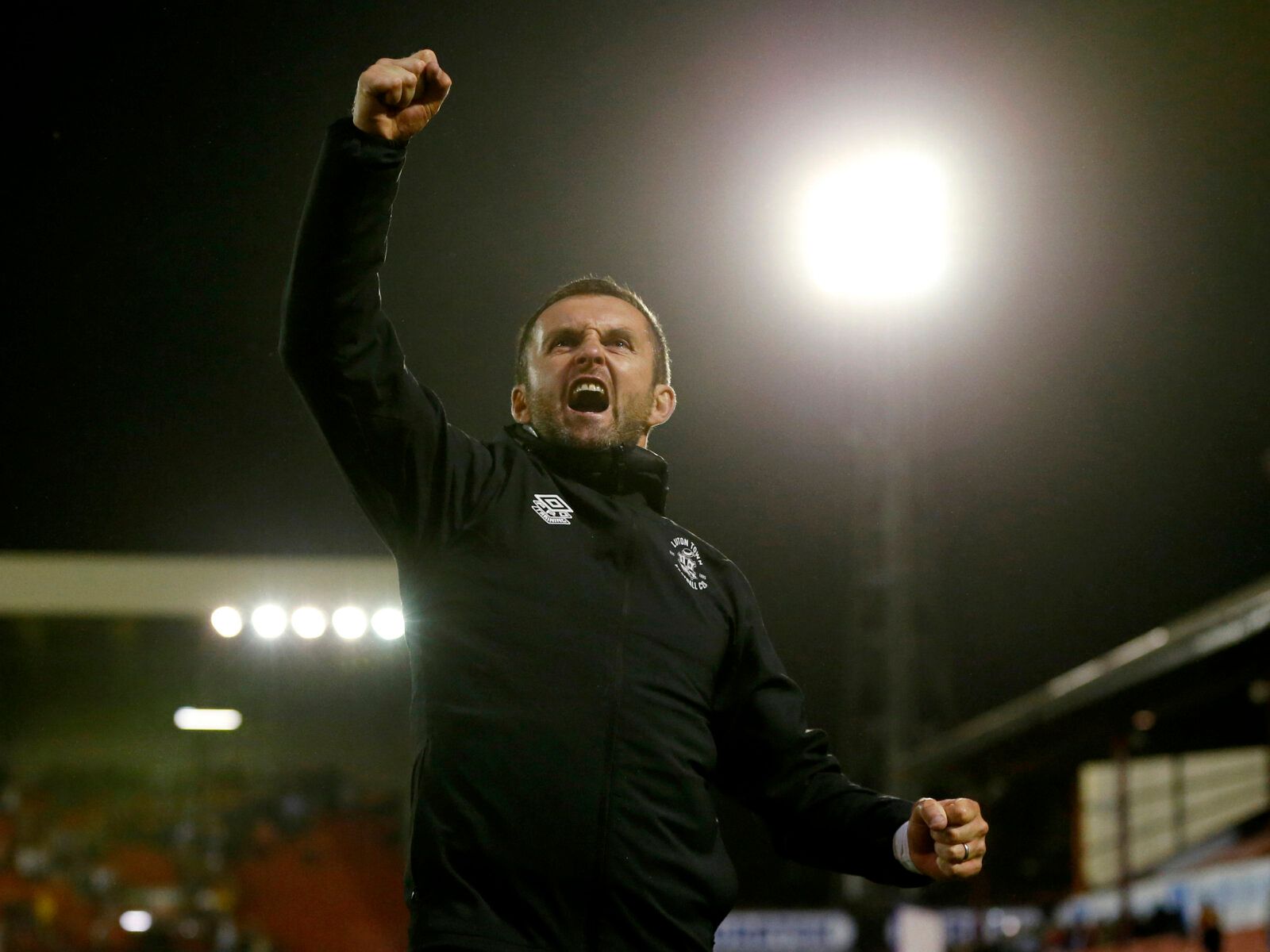 Soccer Football - Championship - Barnsley v Luton Town - Oakwell, Barnsley, Britain - August 17, 2021 Luton Town manager Nathan Jones celebrates after the match Action Images/Ed Sykes EDITORIAL USE ONLY. No use with unauthorized audio, video, data, fixture lists, club/league logos or 'live' services. Online in-match use limited to 75 images, no video emulation. No use in betting, games or single club /league/player publications.  Please contact your account representative for further details.