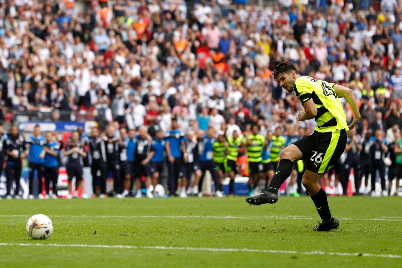 Britain Football Soccer - Reading v Huddersfield Town - Sky Bet Championship Play-Off Final - Wembley Stadium, London, England - 29/5/17 Huddersfield Town's Christopher Schindler scores a penalty to win the penalty shootout and get promoted to the Premier League  Action Images via Reuters / John Sibley Livepic EDITORIAL USE ONLY. No use with unauthorized audio, video, data, fixture lists, club/league logos or 
