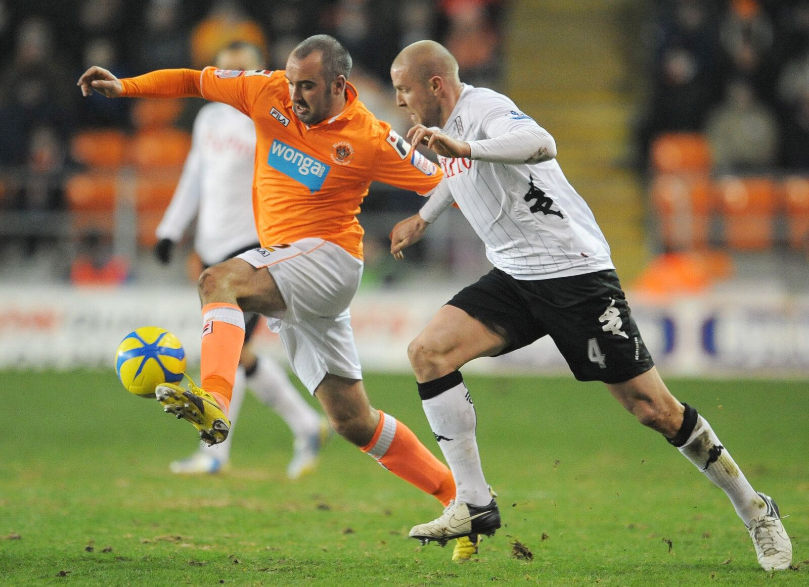 Football - Blackpool v Fulham - FA Cup Third Round Replay - Bloomfield Road - 15/1/13 
Blackpool's Gary Taylor Fletcher and Philippe Senderos of Fulham  
Mandatory Credit: Action Images / Paul Currie 
Livepic