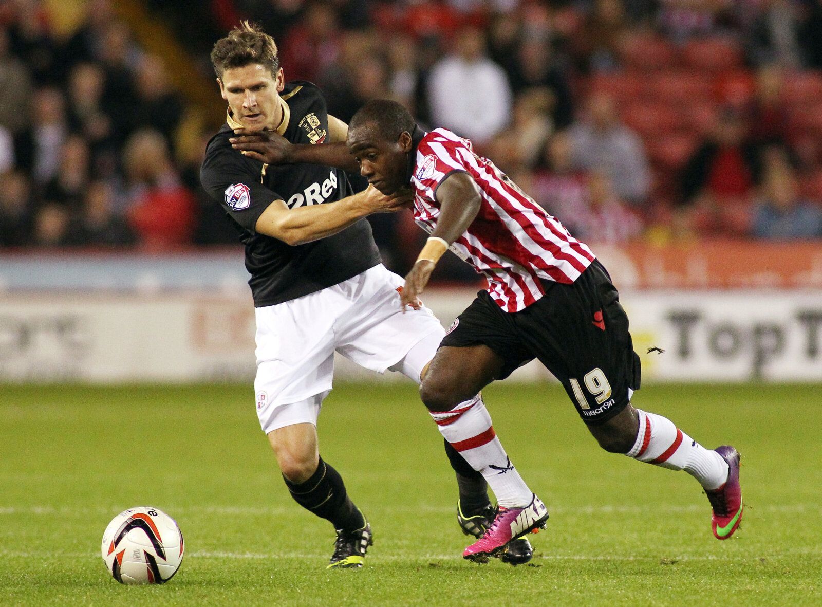 Football - Sheffield United v Crawley Town - Sky Bet Football League One - Bramall Lane - 4/10/13 
Febian Brandy of Sheffiled United (R) and Josh Simpson of Crawley Town in action 
Mandatory Credit: Action Images / Ed Sykes 
Livepic 
EDITORIAL USE ONLY. No use with unauthorized audio, video, data, fixture lists, club/league logos or live services. Online in-match use limited to 45 images, no video emulation. No use in betting, games or single club/league/player publications.  Please contact your