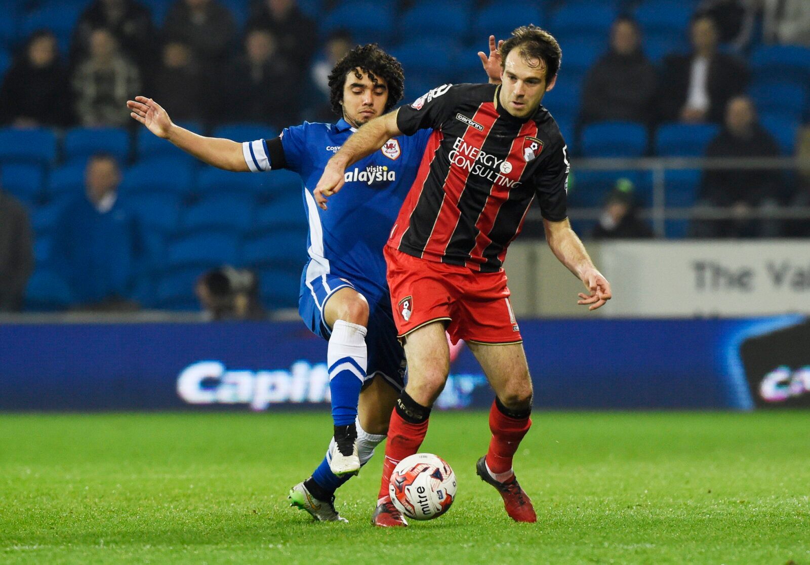 Football - Cardiff City v AFC Bournemouth - Sky Bet Football League Championship - Cardiff City Stadium - 14/15 - 17/3/15 
Cardiff City's Fabio Da Silva in action with Bournemouth's Brett Pitman 
Mandatory Credit: Action Images / Rebecca Naden 
EDITORIAL USE ONLY. No use with unauthorized audio, video, data, fixture lists, club/league logos or 