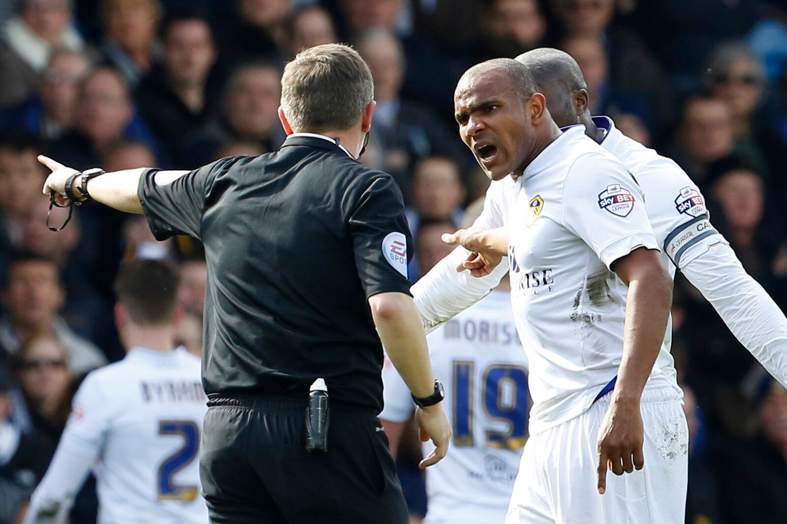 Football - Leeds United v Blackburn Rovers - Sky Bet Football League Championship - Elland Road - 4/4/15 
Leeds United's Rodolph Austin (R) remonstrates with Referee Gary Sutton after being sent off 
Mandatory Credit: Action Images / Craig Brough 
Livepic 
EDITORIAL USE ONLY. No use with unauthorized audio, video, data, fixture lists, club/league logos or 