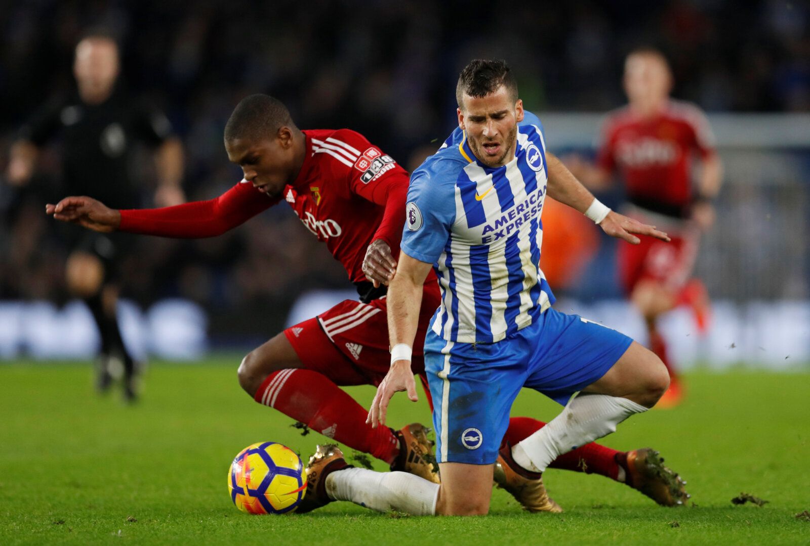 Soccer Football - Premier League - Brighton &amp; Hove Albion vs Watford - The American Express Community Stadium, Brighton, Britain - December 23, 2017   Watford's Christian Kabasele in action with Brighton's Tomer Hemed    Action Images via Reuters/Matthew Childs    EDITORIAL USE ONLY. No use with unauthorized audio, video, data, fixture lists, club/league logos or 