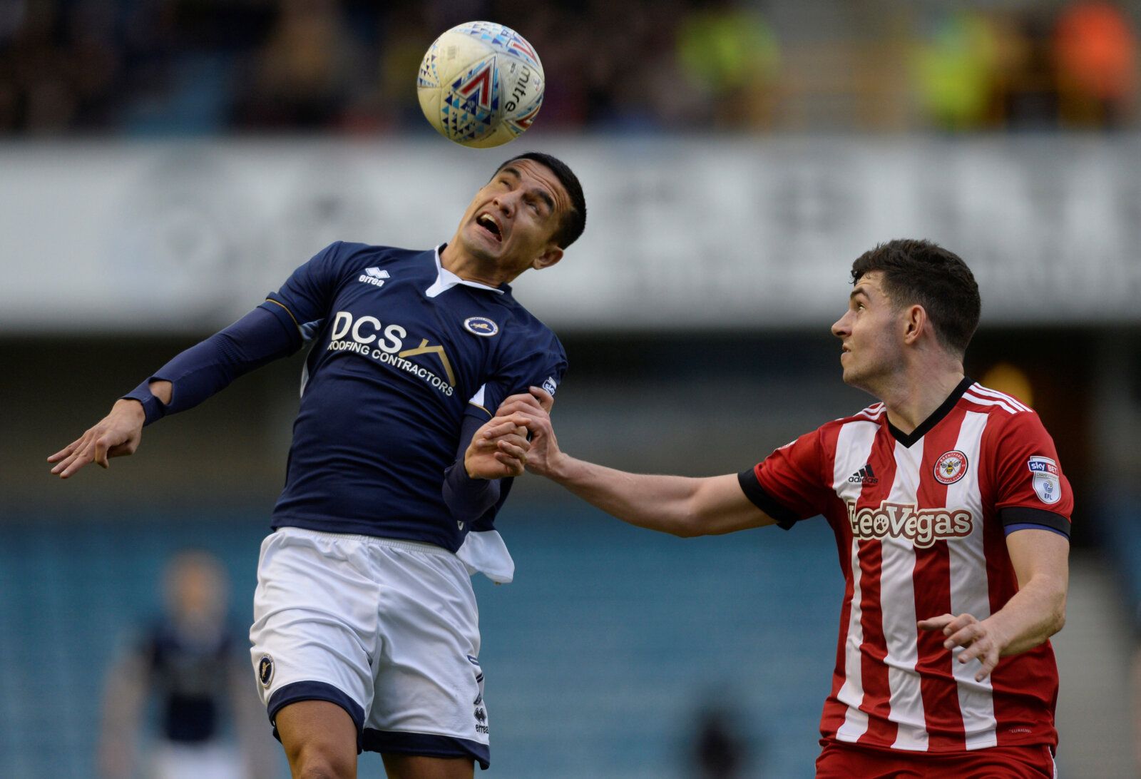Soccer Football - Championship - Millwall vs Brentford - The Den, London, Britain - March 10, 2018  Millwall's Tim Cahill in action with Brentford's John Egan  Action Images/Adam Holt  EDITORIAL USE ONLY. No use with unauthorized audio, video, data, fixture lists, club/league logos or 