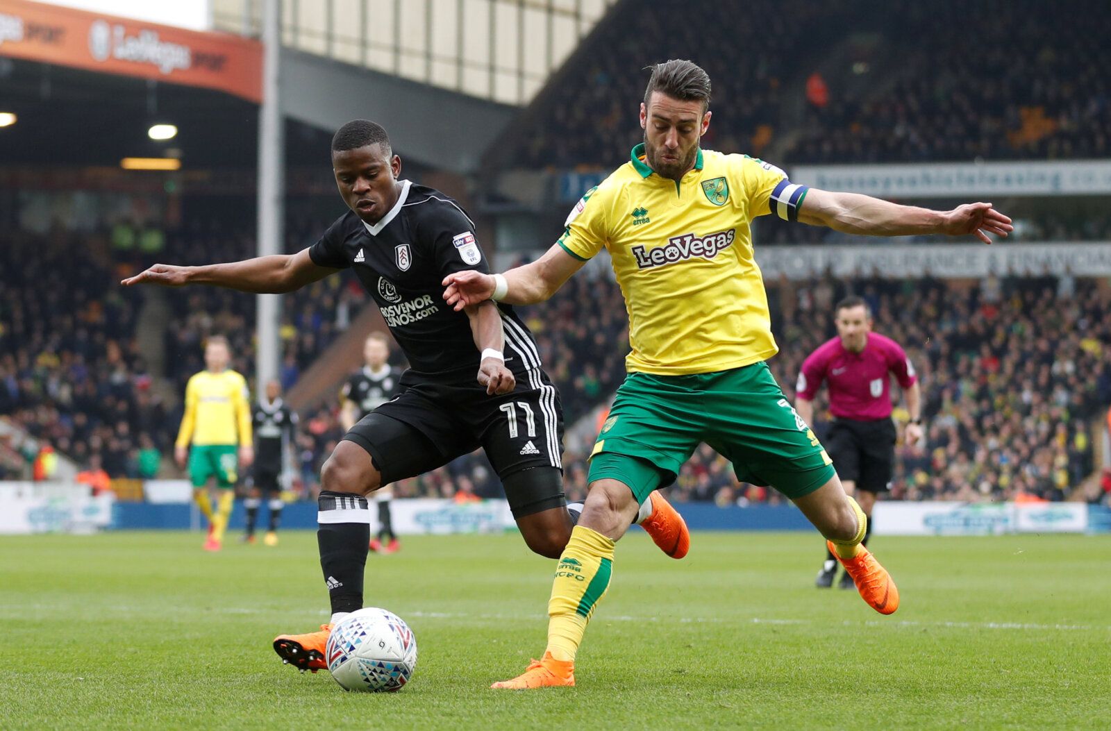 Soccer Football - Championship - Norwich City vs Fulham - Carrow Road, Norwich, Britain - March 30, 2018  Norwich City's Ivo Pinto in action with Fulham's Floyd Ayite   Action Images/Matthew Childs  EDITORIAL USE ONLY. No use with unauthorized audio, video, data, fixture lists, club/league logos or 