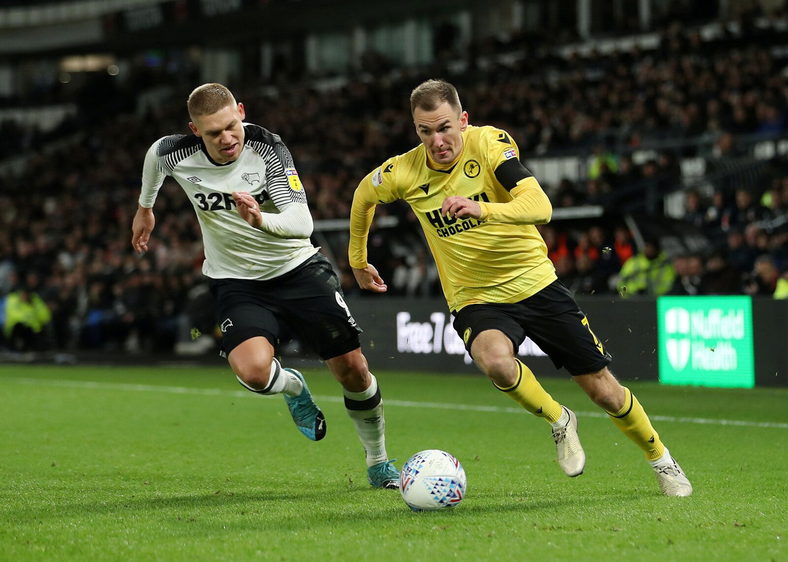 Soccer Football - Championship - Derby County v Millwall - Pride Park, Derby, Britain - December 14, 2019   Millwall's Jed Wallace in action with Derby County's Martyn Waghorn   Action Images/John Clifton    EDITORIAL USE ONLY. No use with unauthorized audio, video, data, fixture lists, club/league logos or 