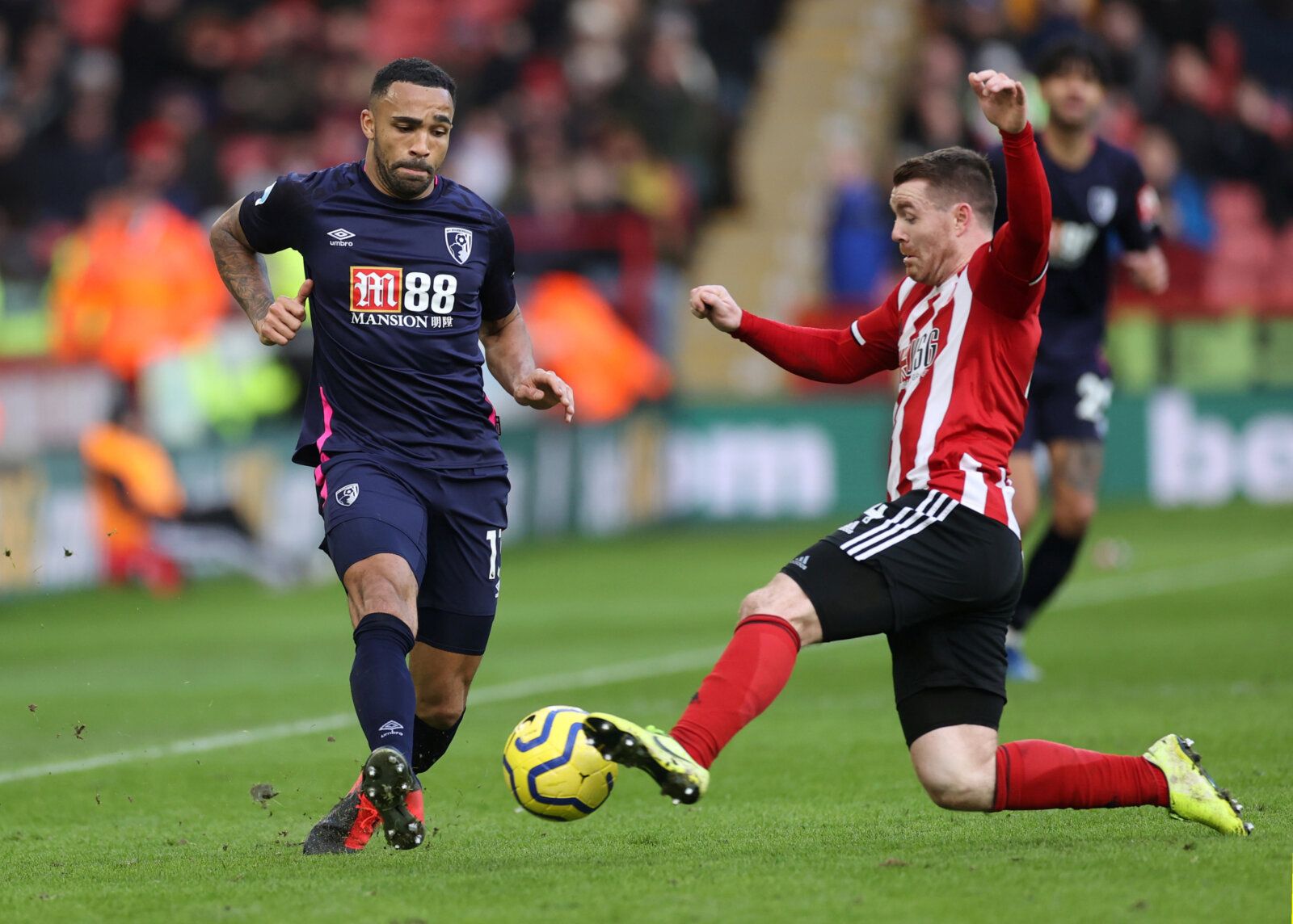 Soccer Football - Premier League - Sheffield United v AFC Bournemouth - Bramall Lane, Sheffield, Britain - February 9, 2020  Bournemouth's Callum Wilson in action with Sheffield United's John Fleck   Action Images via Reuters/Carl Recine  EDITORIAL USE ONLY. No use with unauthorized audio, video, data, fixture lists, club/league logos or 